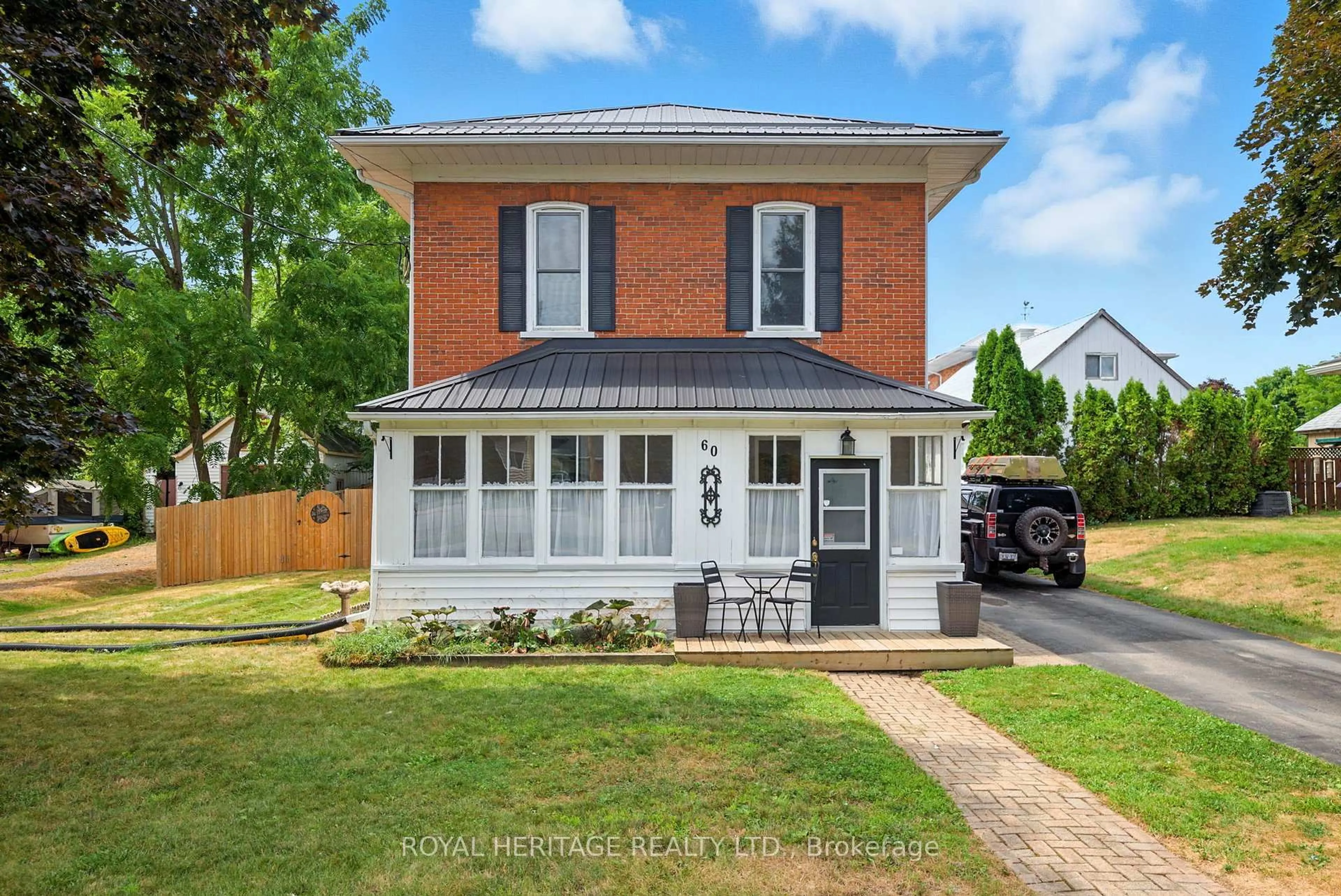 Home with brick exterior material, street for 60 Booth St, Trent Hills Ontario K0L 1L0