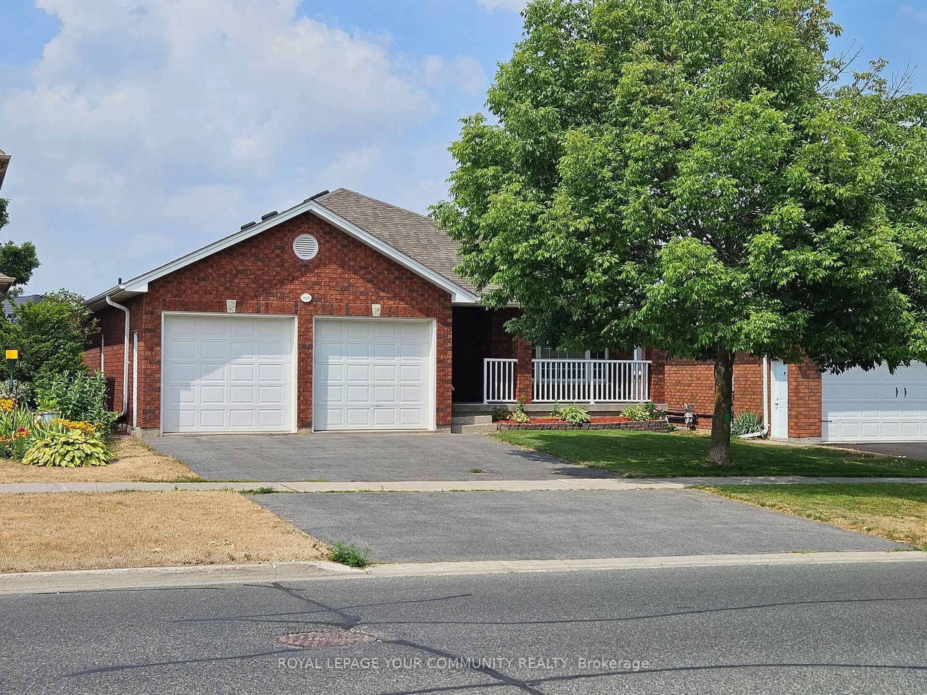 Home with brick exterior material, street for 1615 Ravenwood Dr, Peterborough West Ontario K9K 2P8