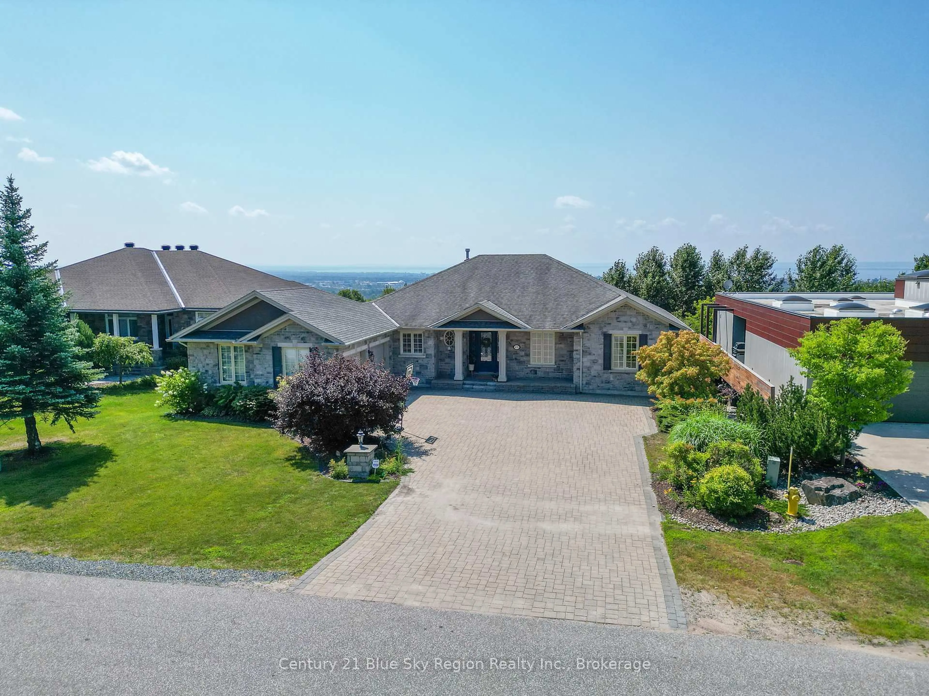 A pic from outside/outdoor area/front of a property/back of a property/a pic from drone, water/lake/river/ocean view for 435 Surrey Dr, North Bay Ontario P1C 0A1