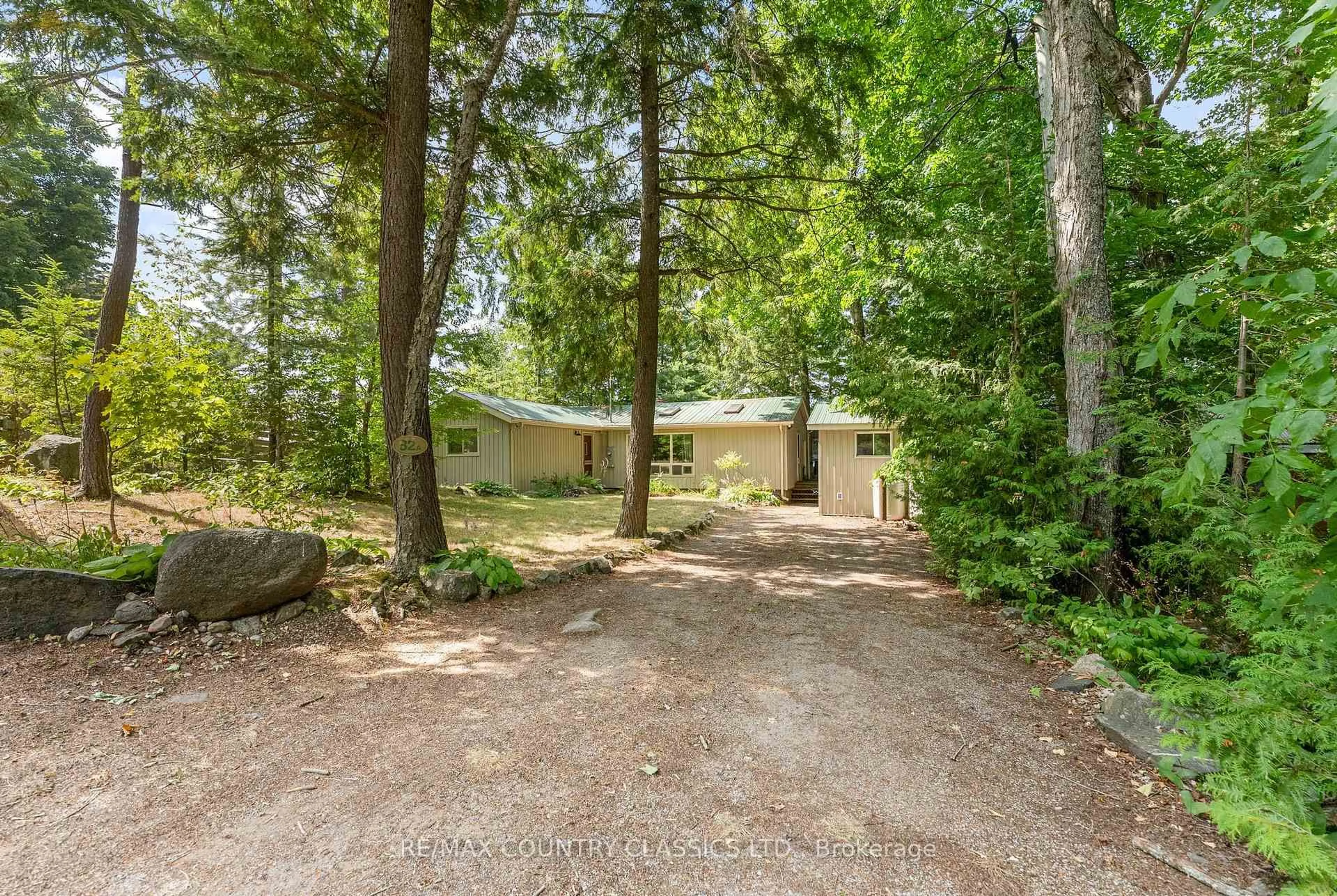 A pic from outside/outdoor area/front of a property/back of a property/a pic from drone, forest/trees view for 82A Chescher Cres, Coe Hill Ontario K0L 1P0