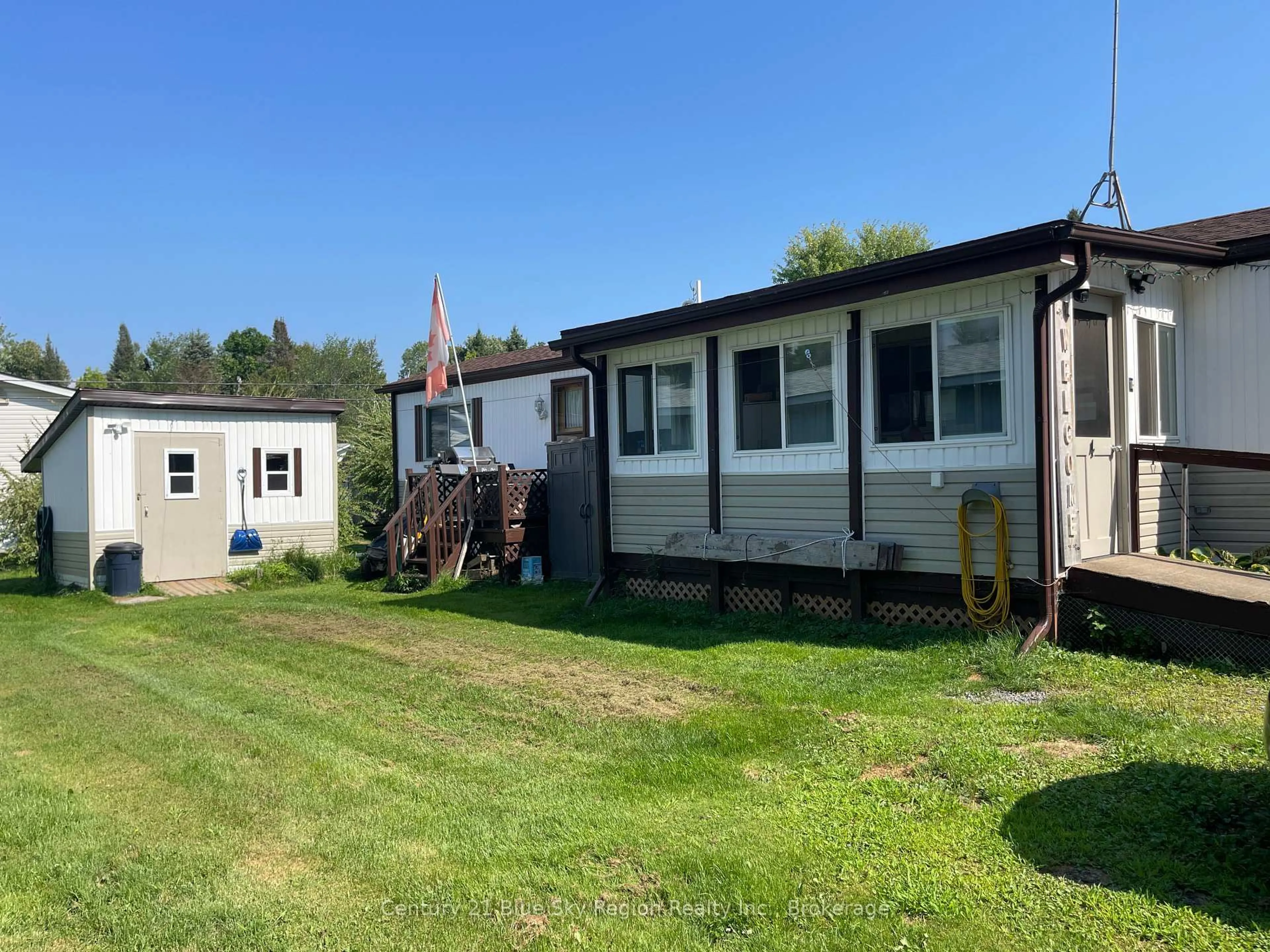 A pic from outside/outdoor area/front of a property/back of a property/a pic from drone, unknown for 395 RIVERBEND Rd #4, North Bay Ontario P1B 8Z4