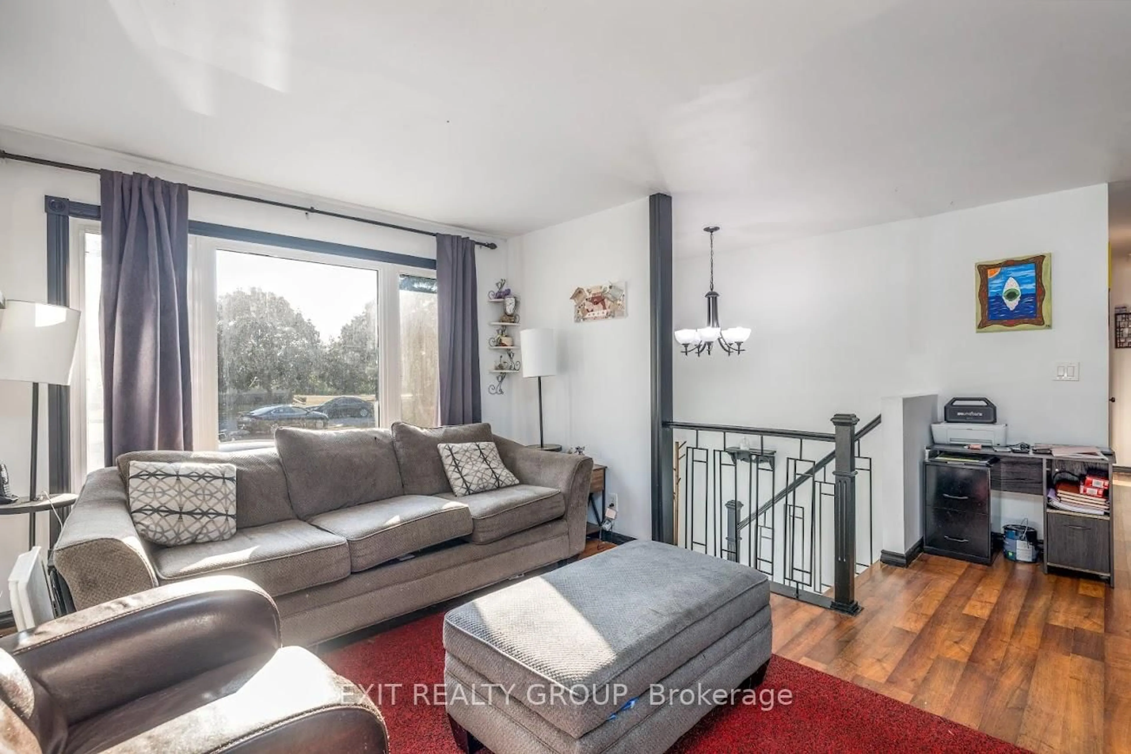 Living room with furniture, wood/laminate floor for 4 Dixie Pl, Belleville Ontario K8P 5A9