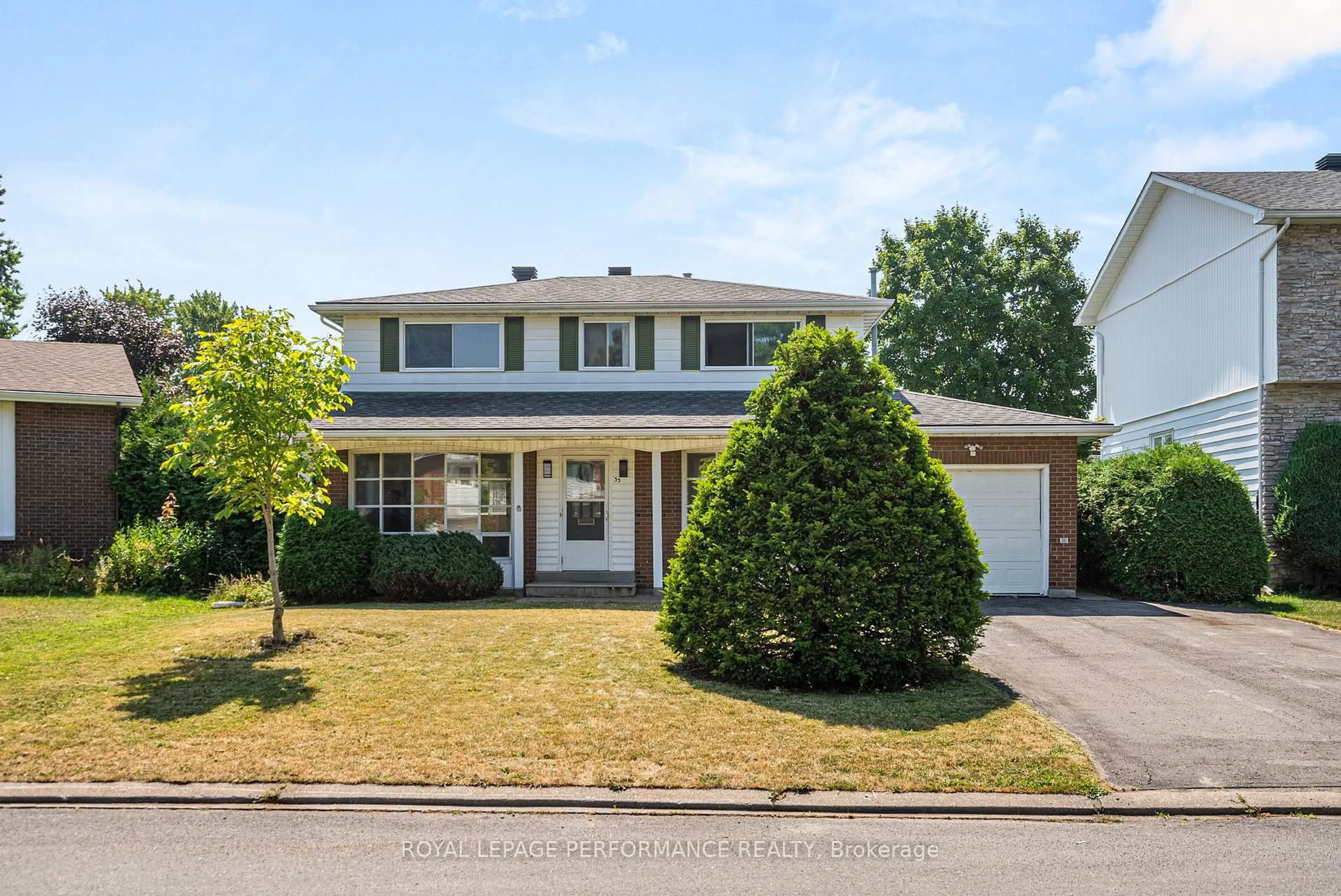 Home with brick exterior material, street for 33 Woodview Cres, Ottawa Ontario K1B 3B1