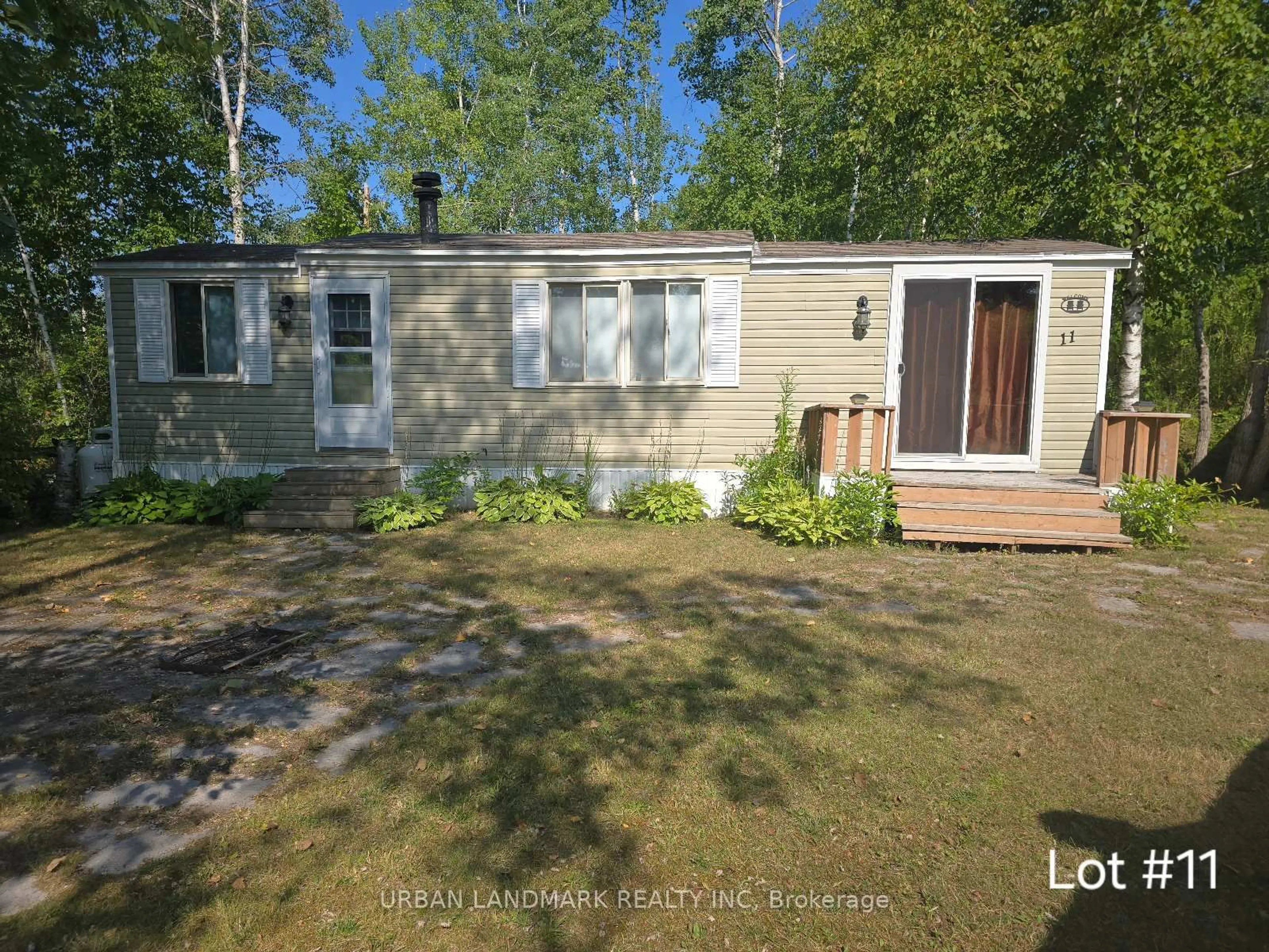 A pic from outside/outdoor area/front of a property/back of a property/a pic from drone, street for 302 Quin Mo Lac Rd, Madoc Ontario K0K 2K0