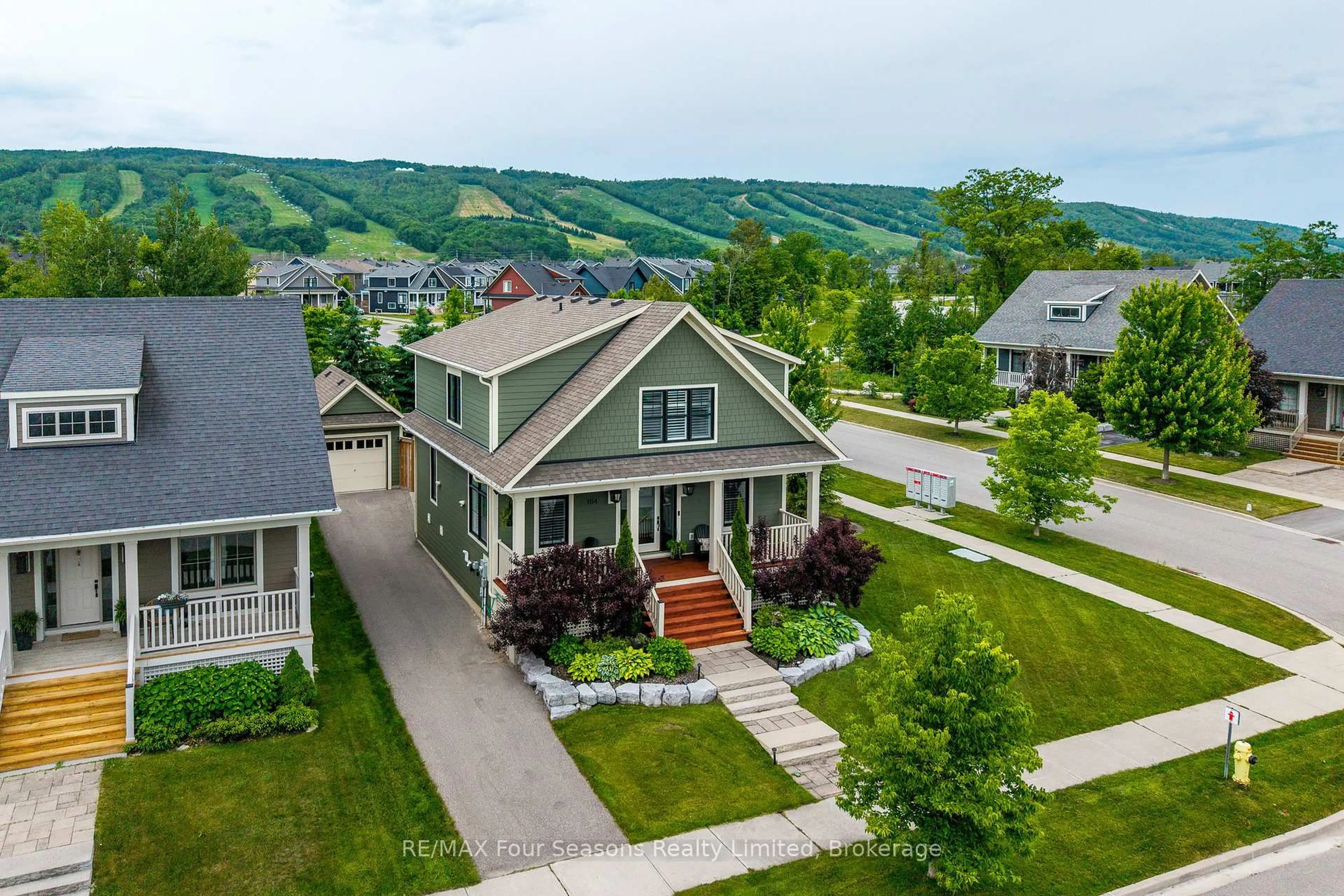 A pic from outside/outdoor area/front of a property/back of a property/a pic from drone, mountain view for 164 Snow Apple Cres, Blue Mountains Ontario L9Y 0Y1