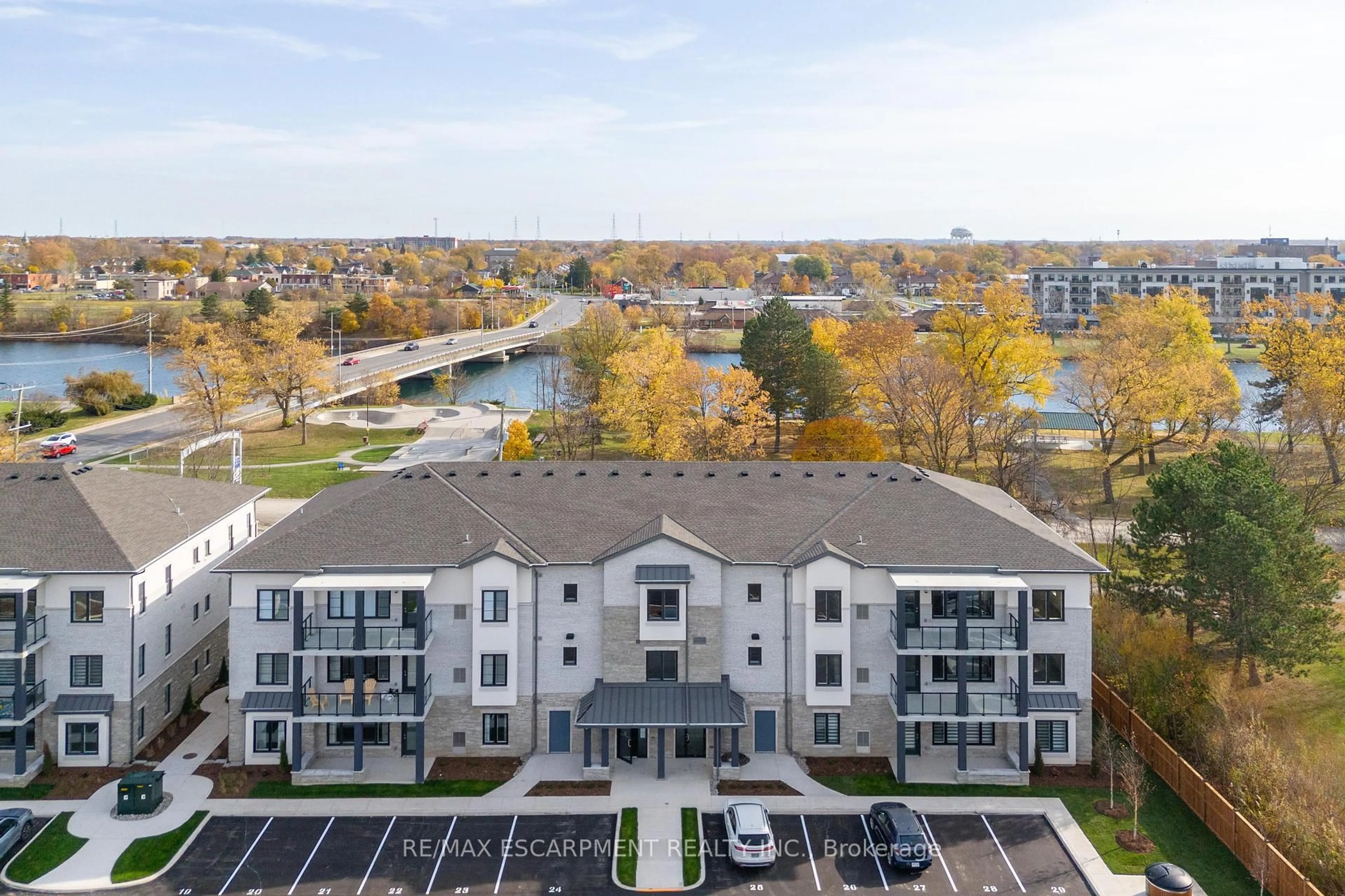 A pic from outside/outdoor area/front of a property/back of a property/a pic from drone, water/lake/river/ocean view for 123 Lincoln St #309, Welland Ontario L3C 6P8