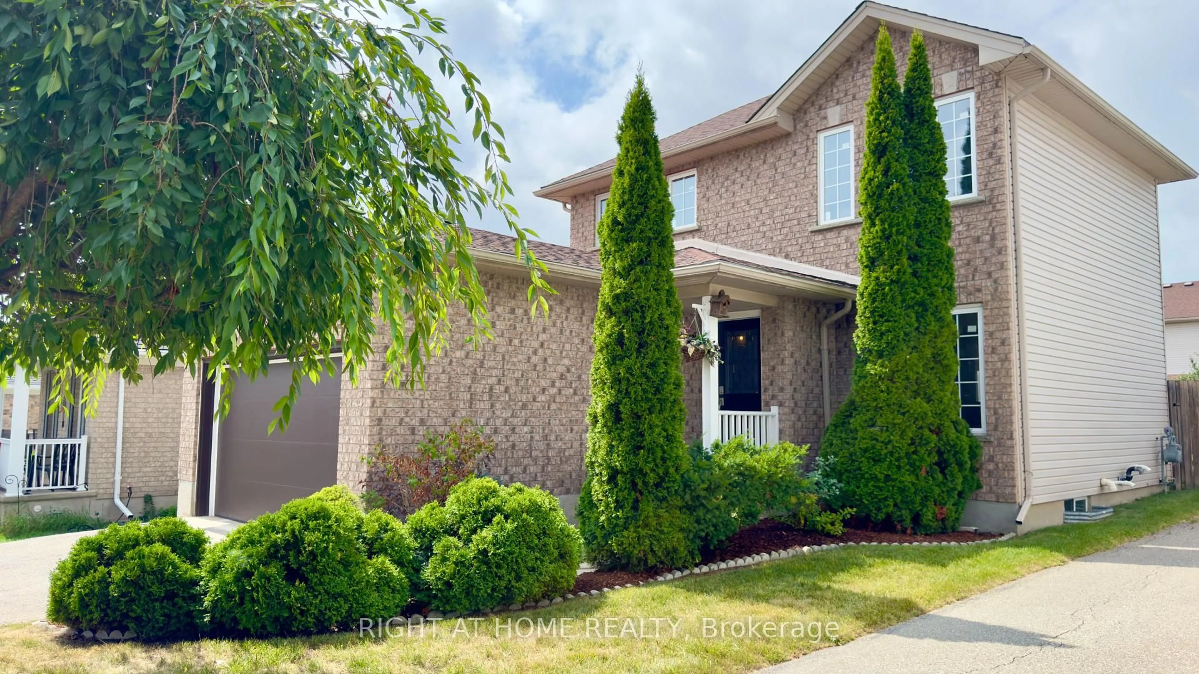 Home with brick exterior material, street for 19 Windflower Dr, Kitchener Ontario N2E 3L3