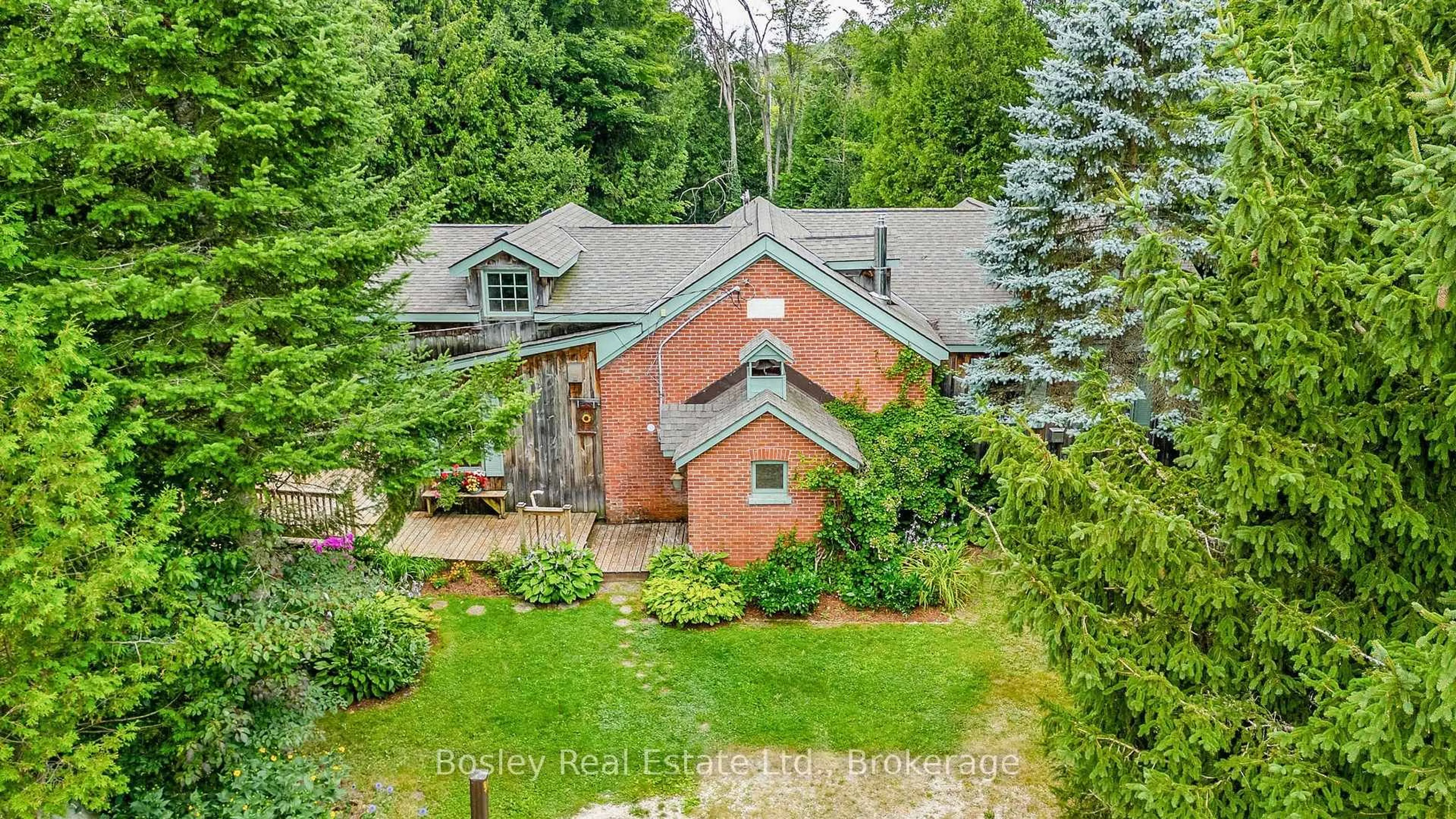 A pic from outside/outdoor area/front of a property/back of a property/a pic from drone, unknown for 355276 The Blue Mountains Euphrasia Townline, Blue Mountains Ontario N0H 1J0