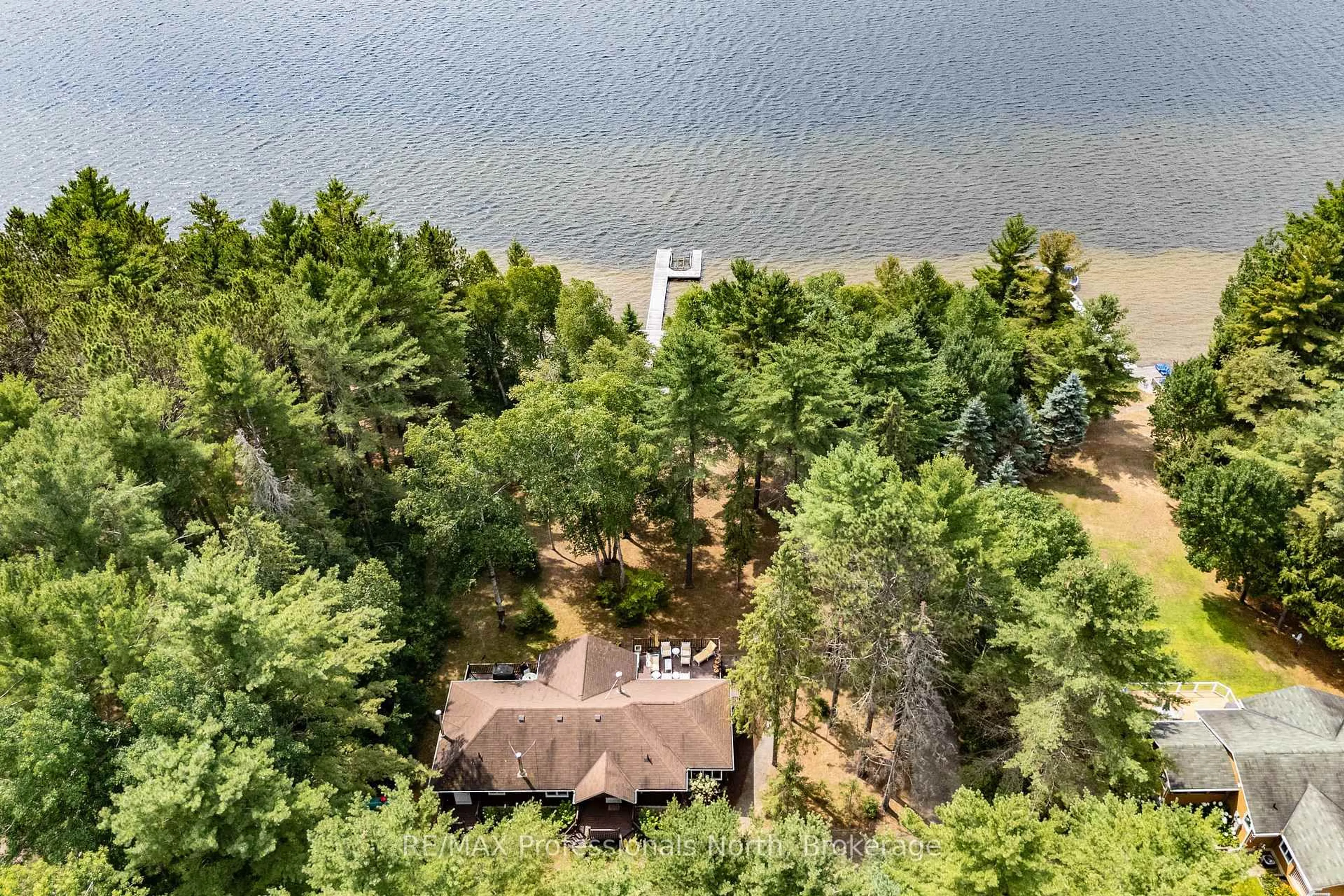 A pic from outside/outdoor area/front of a property/back of a property/a pic from drone, water/lake/river/ocean view for 1140 Seabreeze Rd, Lake of Bays Ontario P0A 1H0