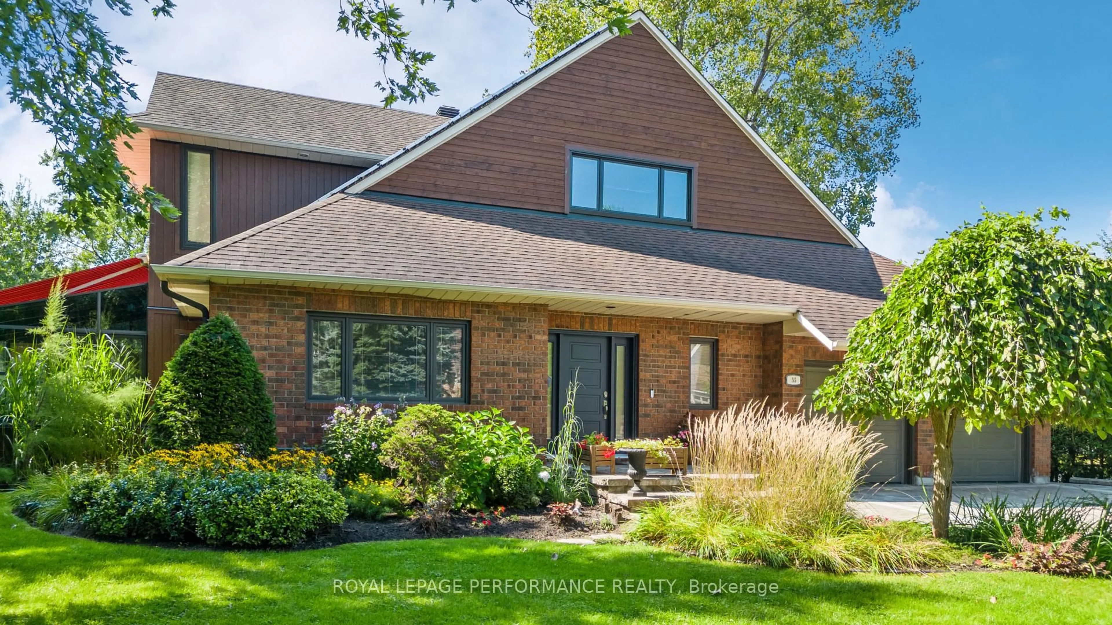 Home with brick exterior material, street for 55 Delong Dr, Ottawa Ontario K1J 7E4