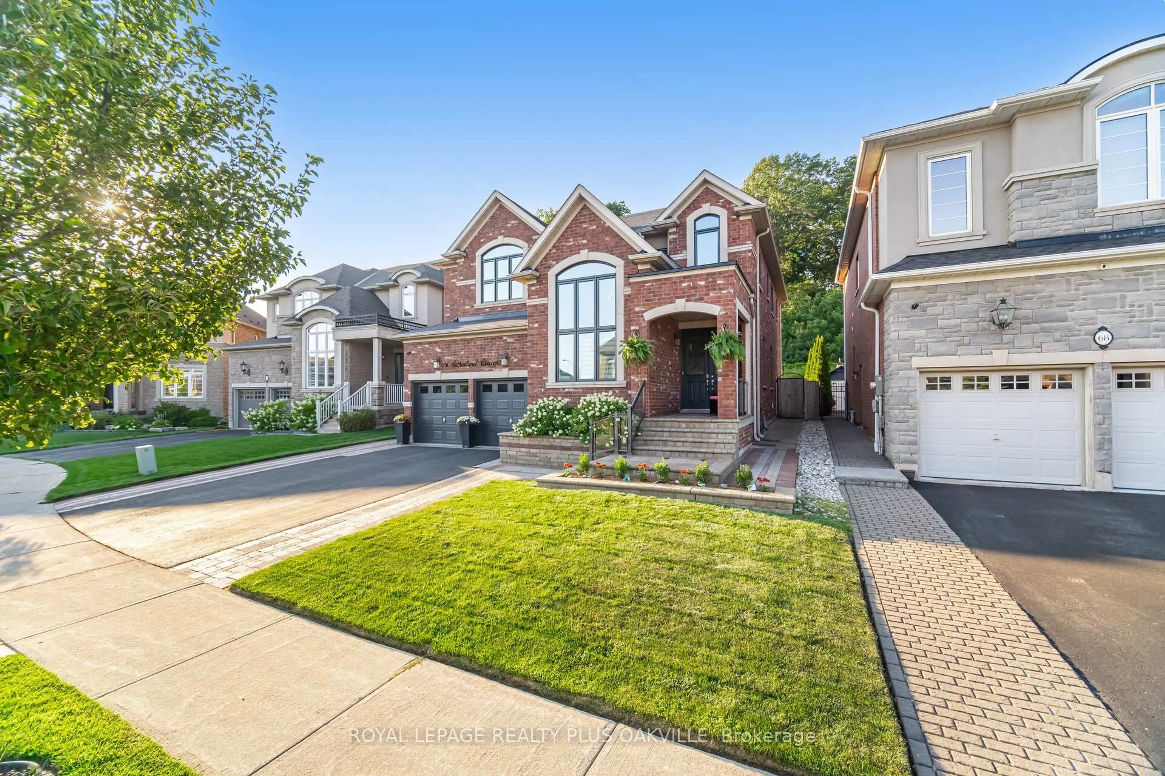 Home with brick exterior material, street for 64 Sutherland Cres, Hamilton Ontario L9K 0H1