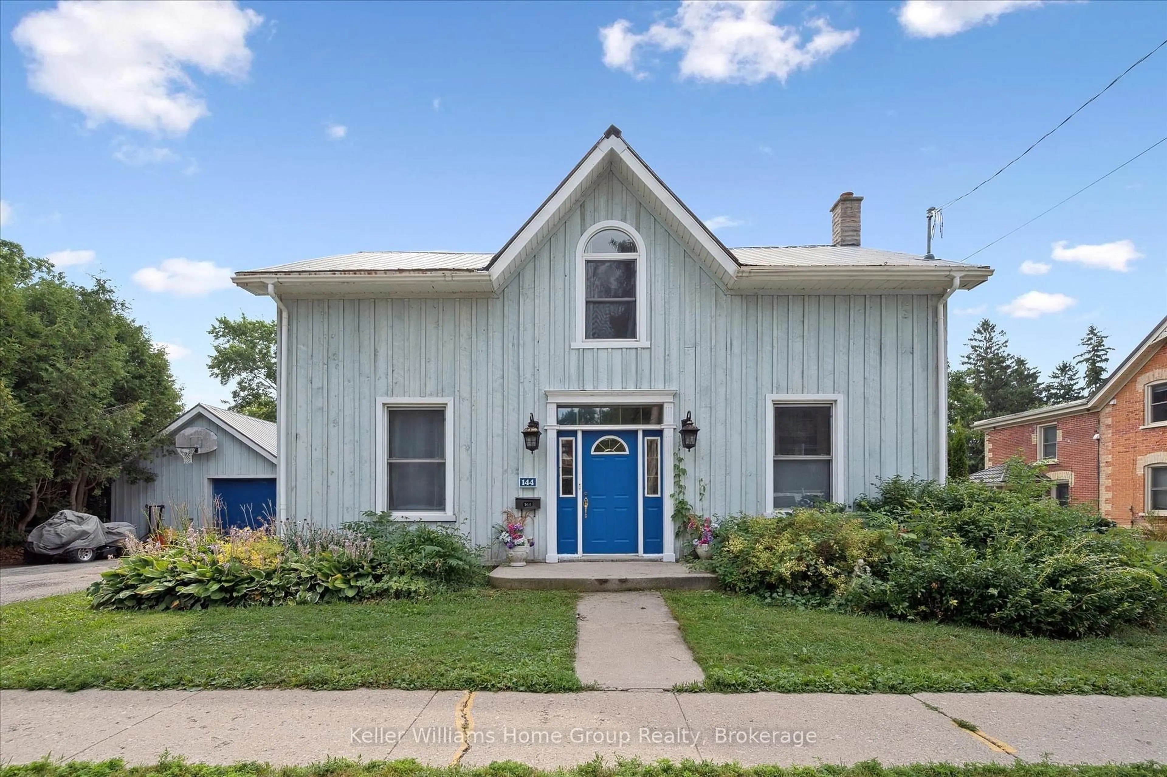 Home with vinyl exterior material, street for 144 Hill St, Centre Wellington Ontario N1M 1G9