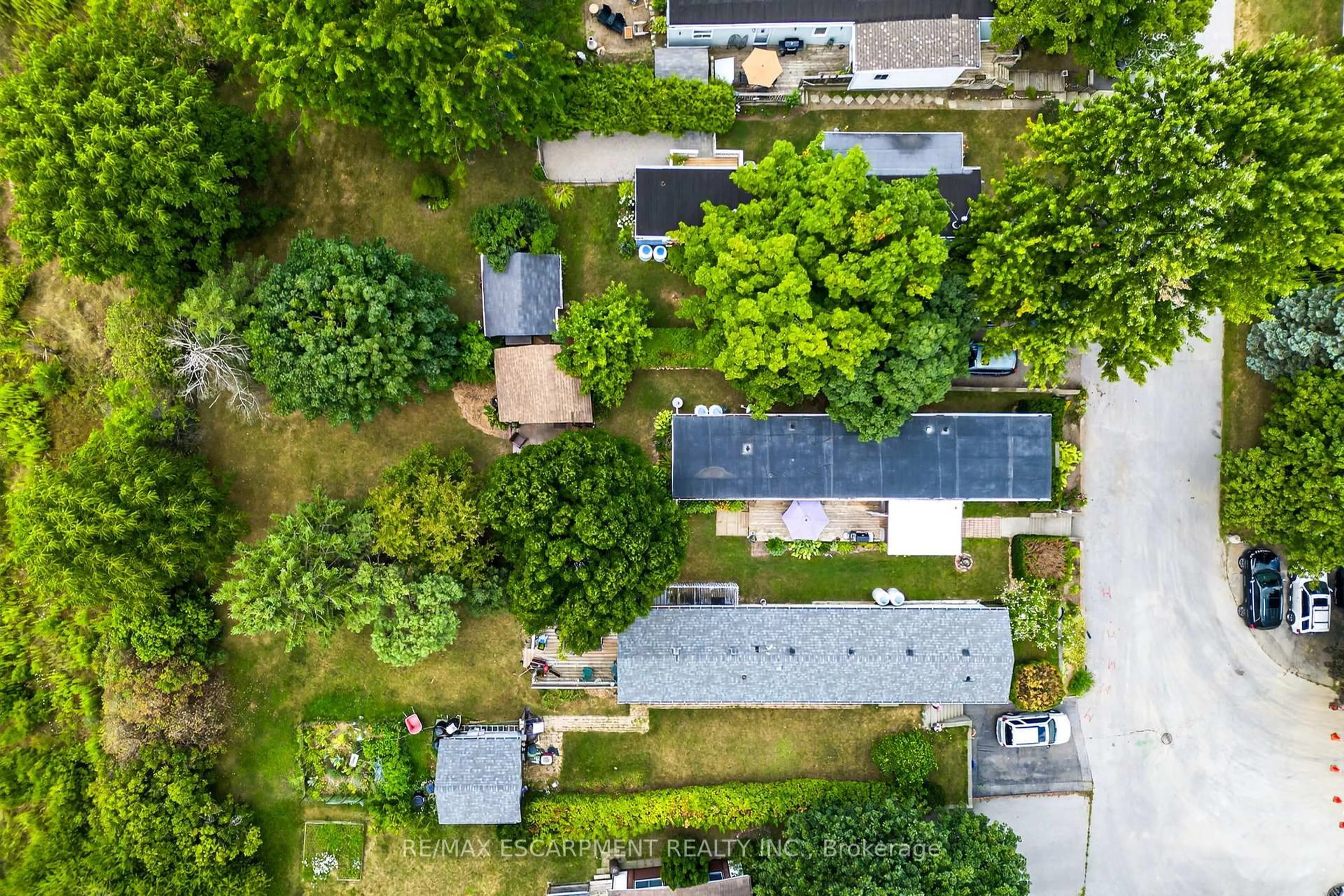 A pic from outside/outdoor area/front of a property/back of a property/a pic from drone, street for 1294 Concession 8 Rd #139 Maple Cres, Hamilton Ontario N0B 2J0