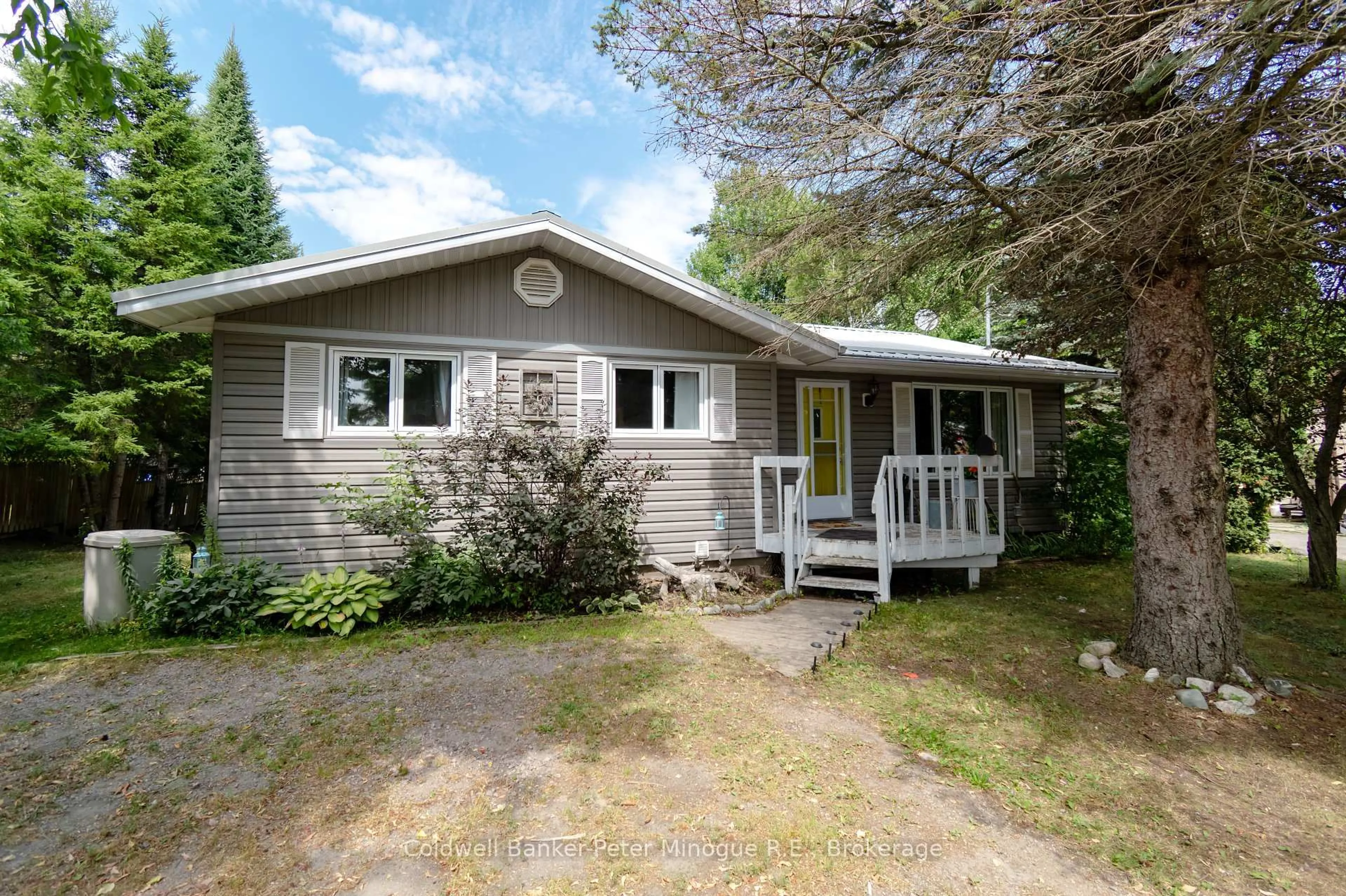 Home with vinyl exterior material, street for 110 Swale St, Callander Ontario P0H 1H0