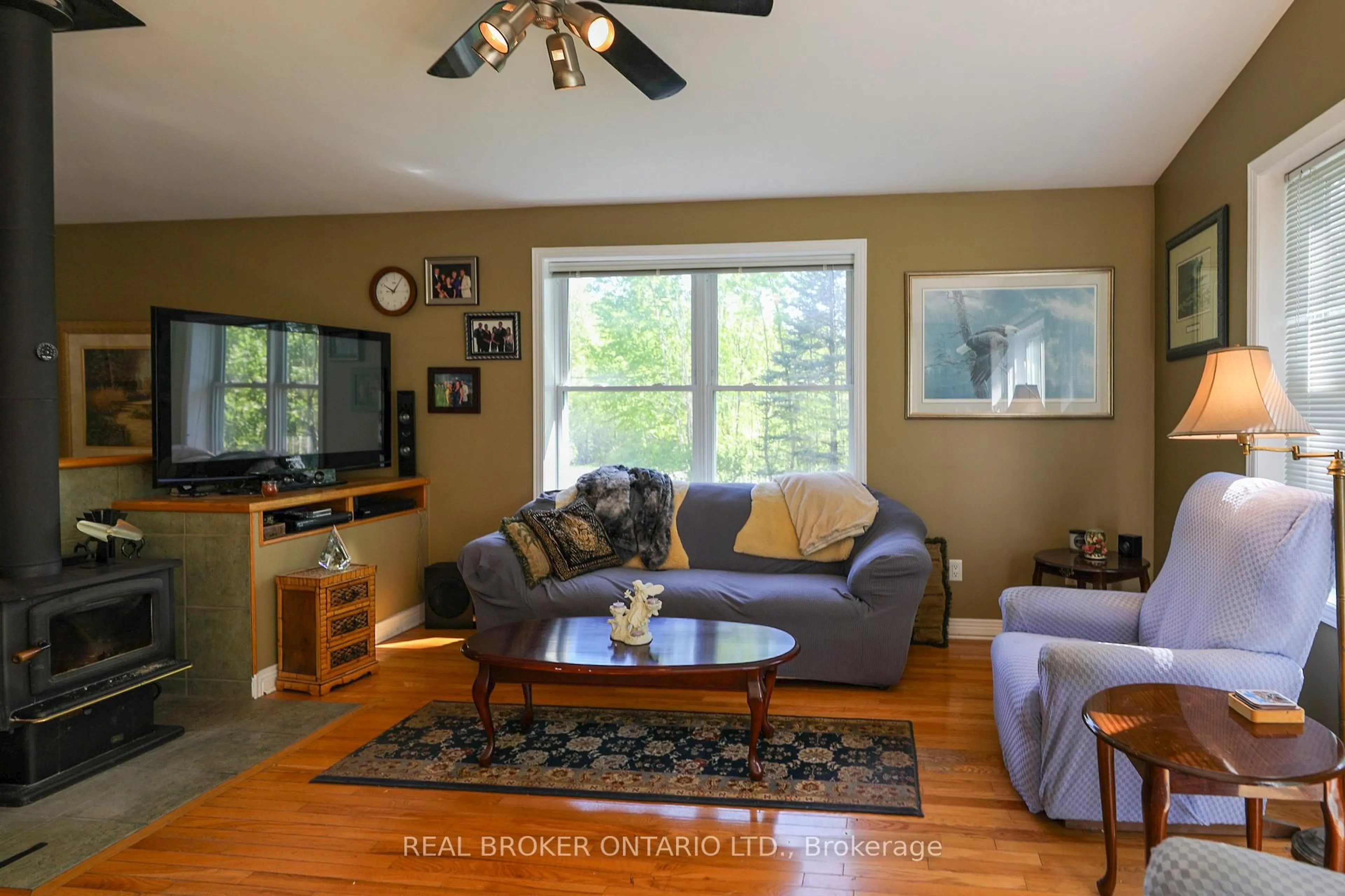 Living room with furniture, wood/laminate floor for 988 County 44 Rd, North Grenville Ontario K0G 1T0