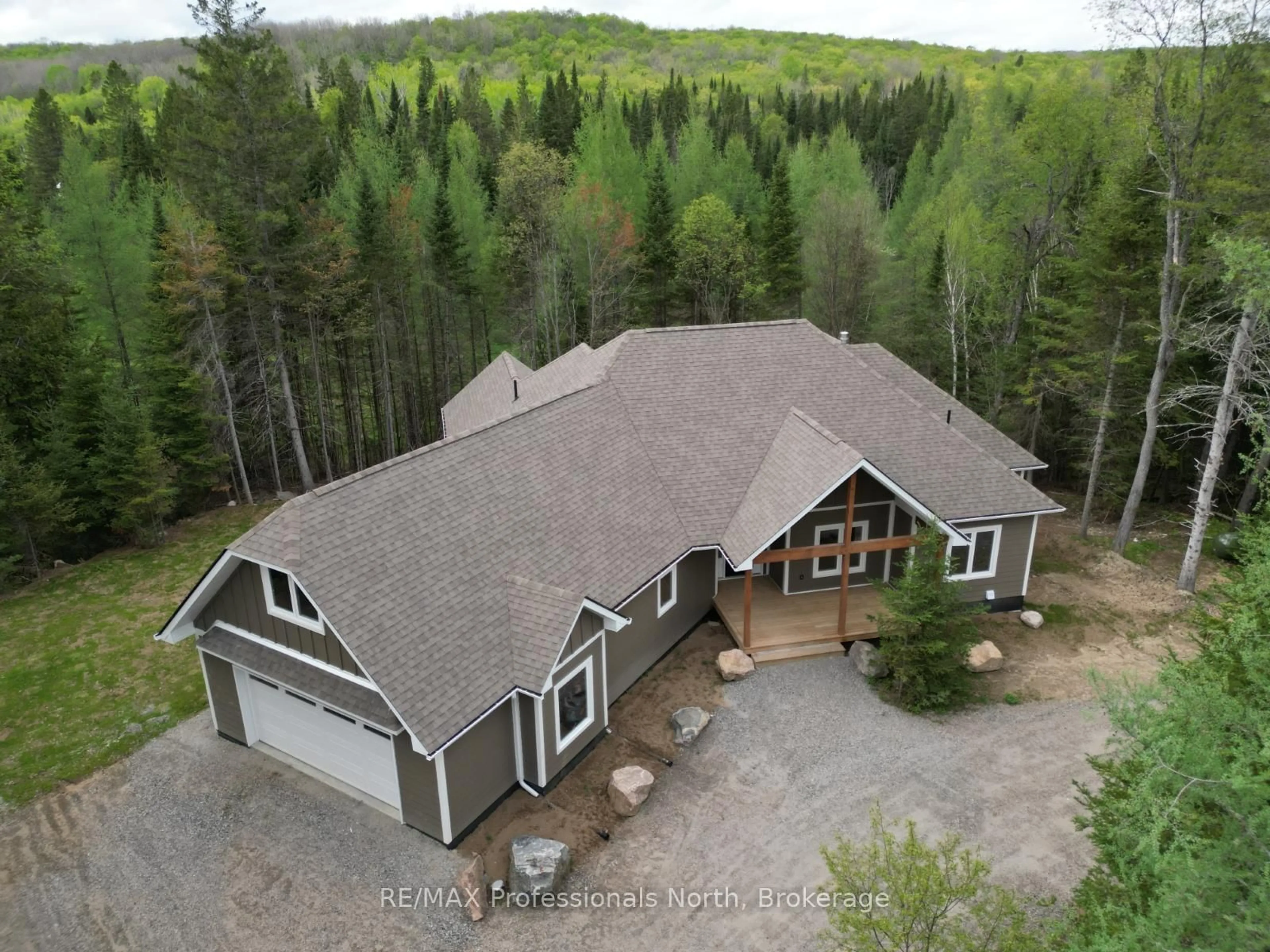 A pic from outside/outdoor area/front of a property/back of a property/a pic from drone, unknown for 1031 Stothart Creek Rd, Dysart et al Ontario K0M 1S0