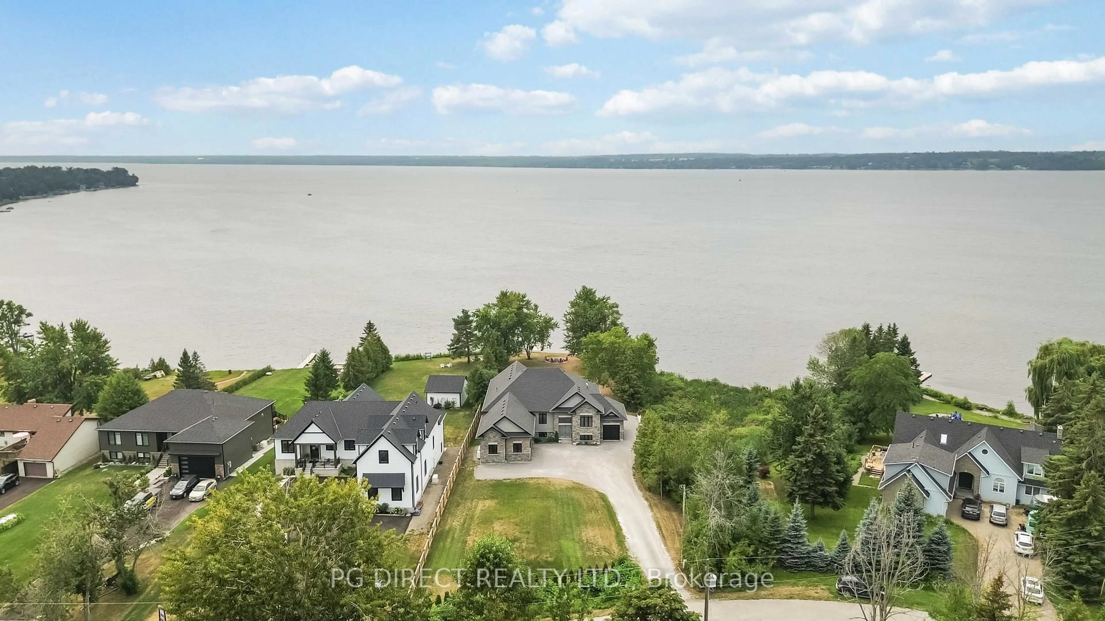 A pic from outside/outdoor area/front of a property/back of a property/a pic from drone, water/lake/river/ocean view for 46 Pleasant View Cres, Kawartha Lakes Ontario K0M 2C0
