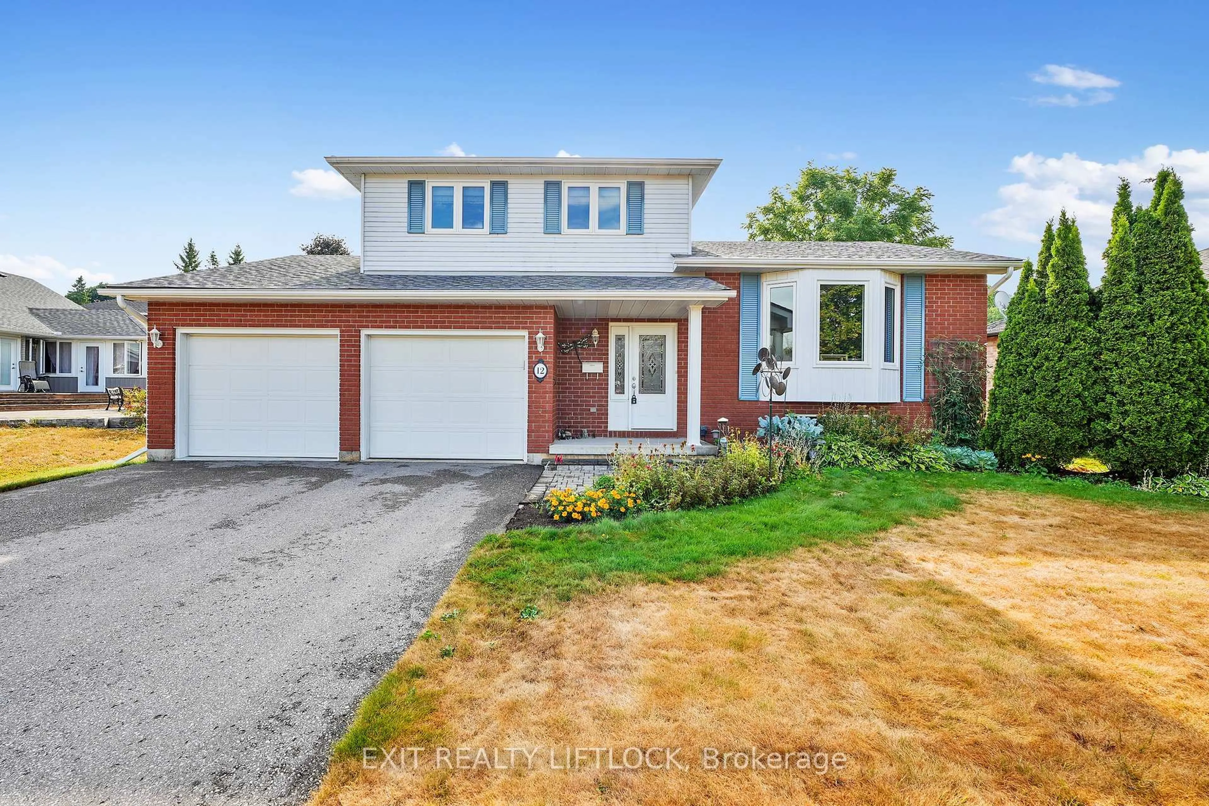 Home with brick exterior material, street for 12 Victoria Ave, Smith-Ennismore-Lakefield Ontario K0L 2H0