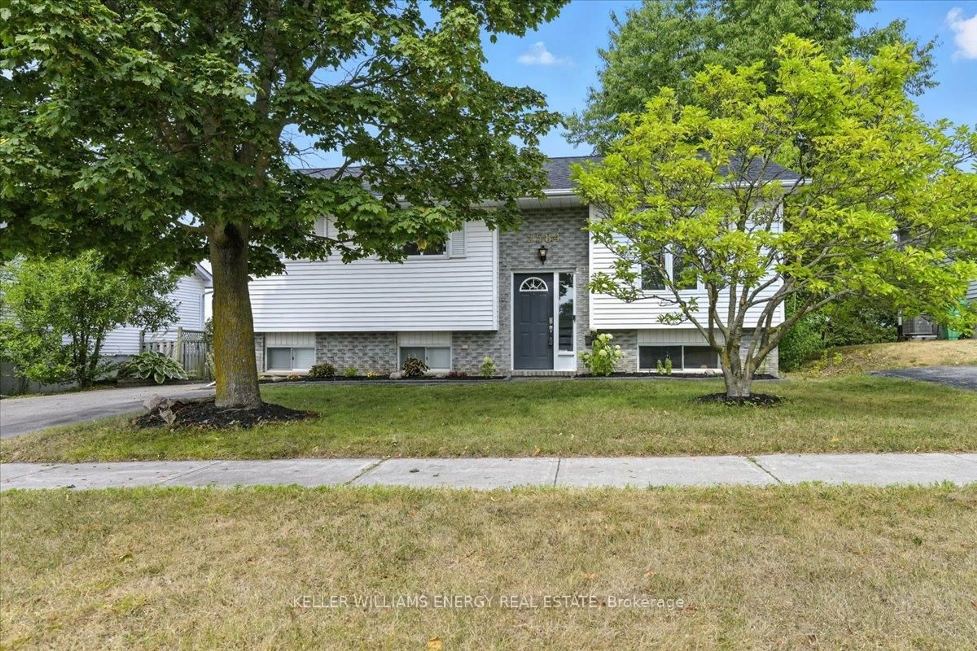 Home with vinyl exterior material, street for 2584 Marsdale Dr, Peterborough East Ontario K9L 1R4