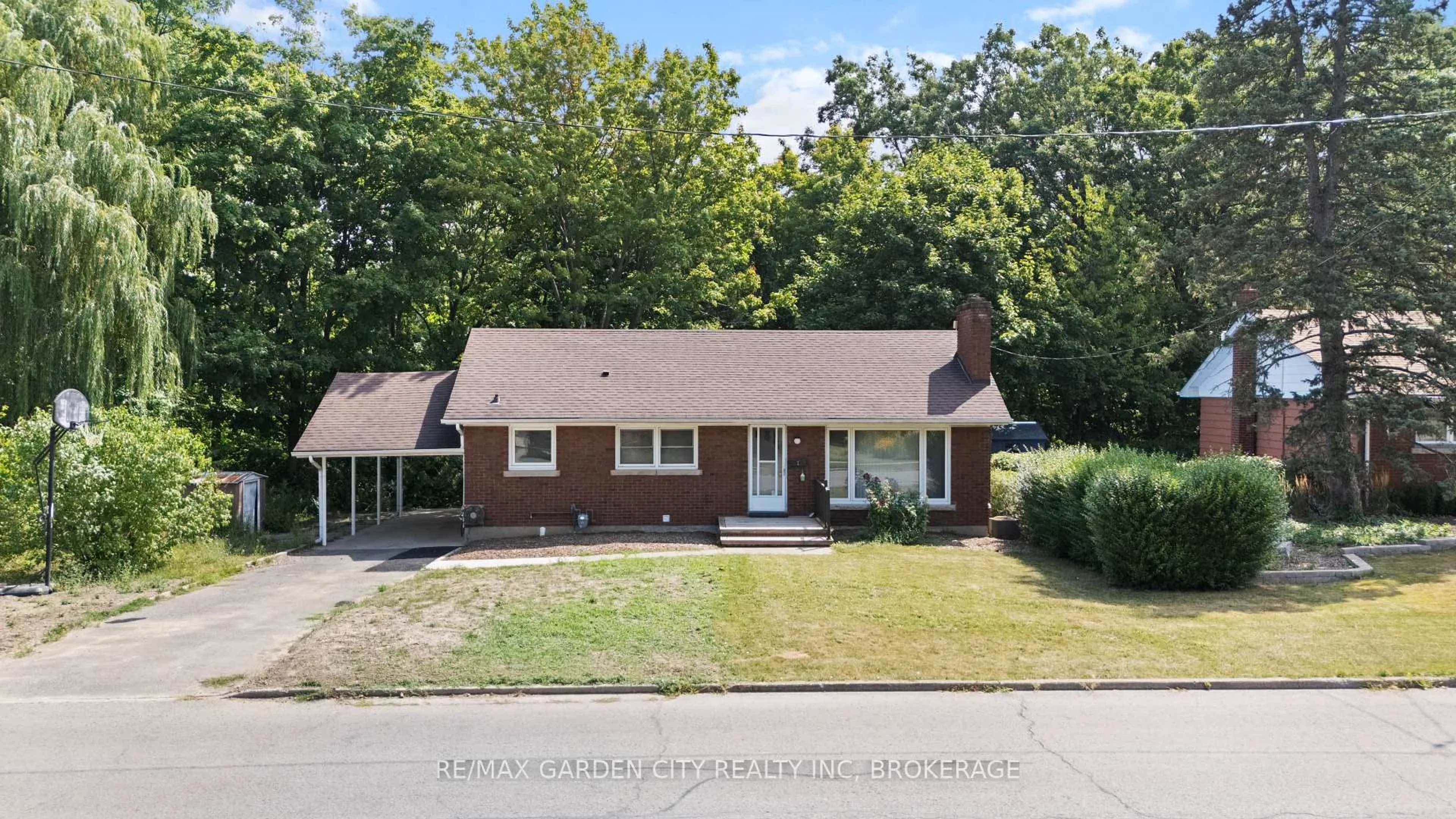 Home with brick exterior material, street for 1 Caroline St, St. Catharines Ontario L2T 3E9