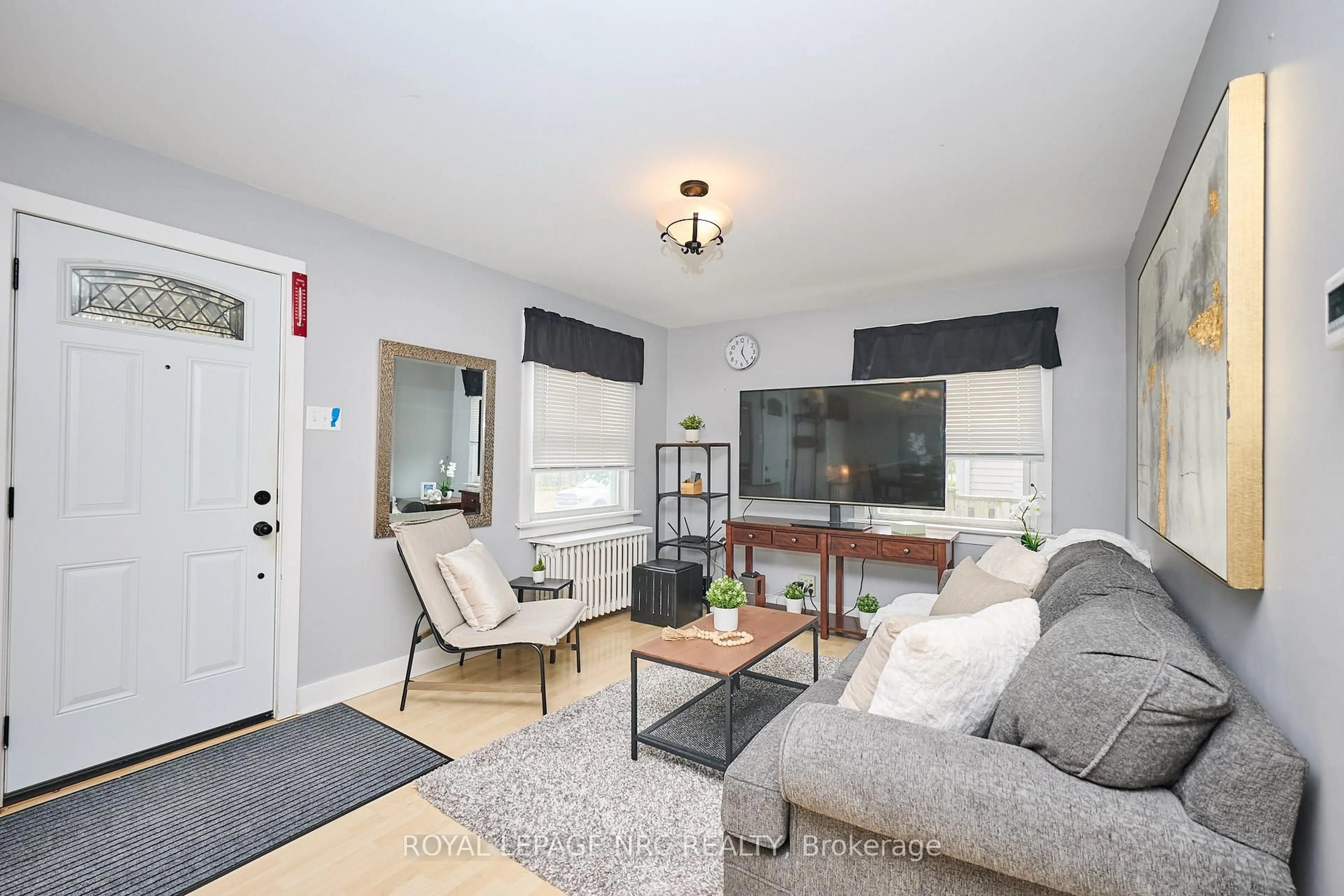 Living room with furniture, unknown for 8 Woodburn Ave, St. Catharines Ontario L2P 2W7