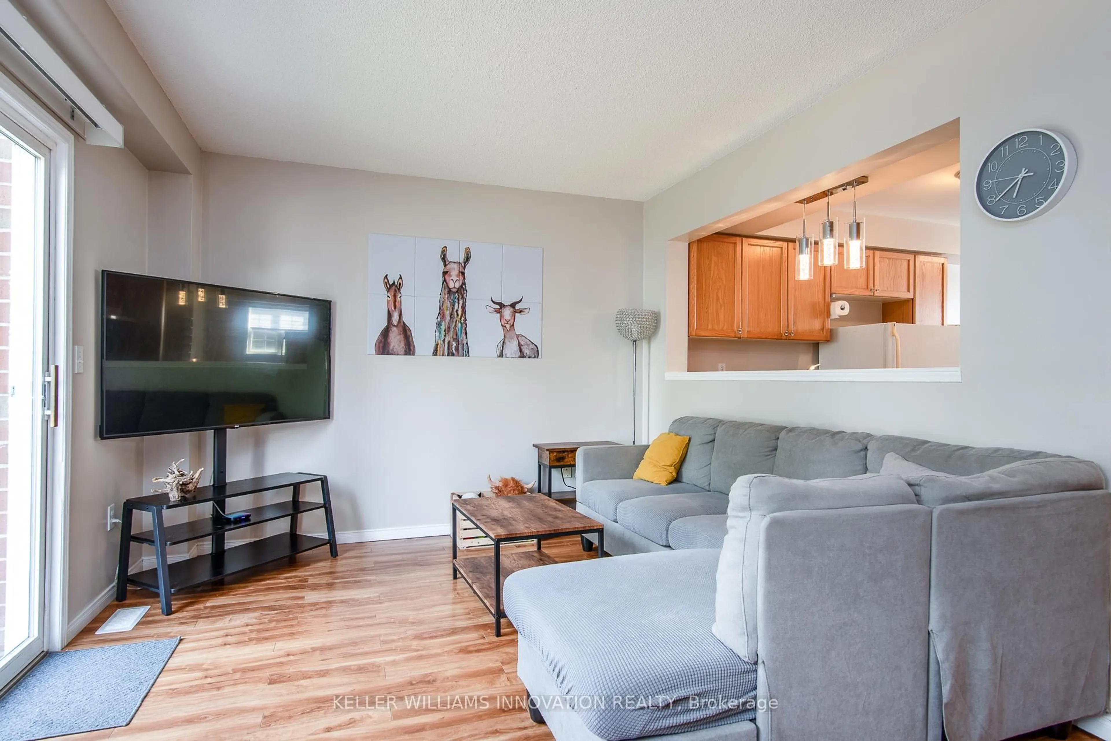 Living room with furniture, wood/laminate floor for 400 Wilson Ave #19, Kitchener Ontario N2C 2S1