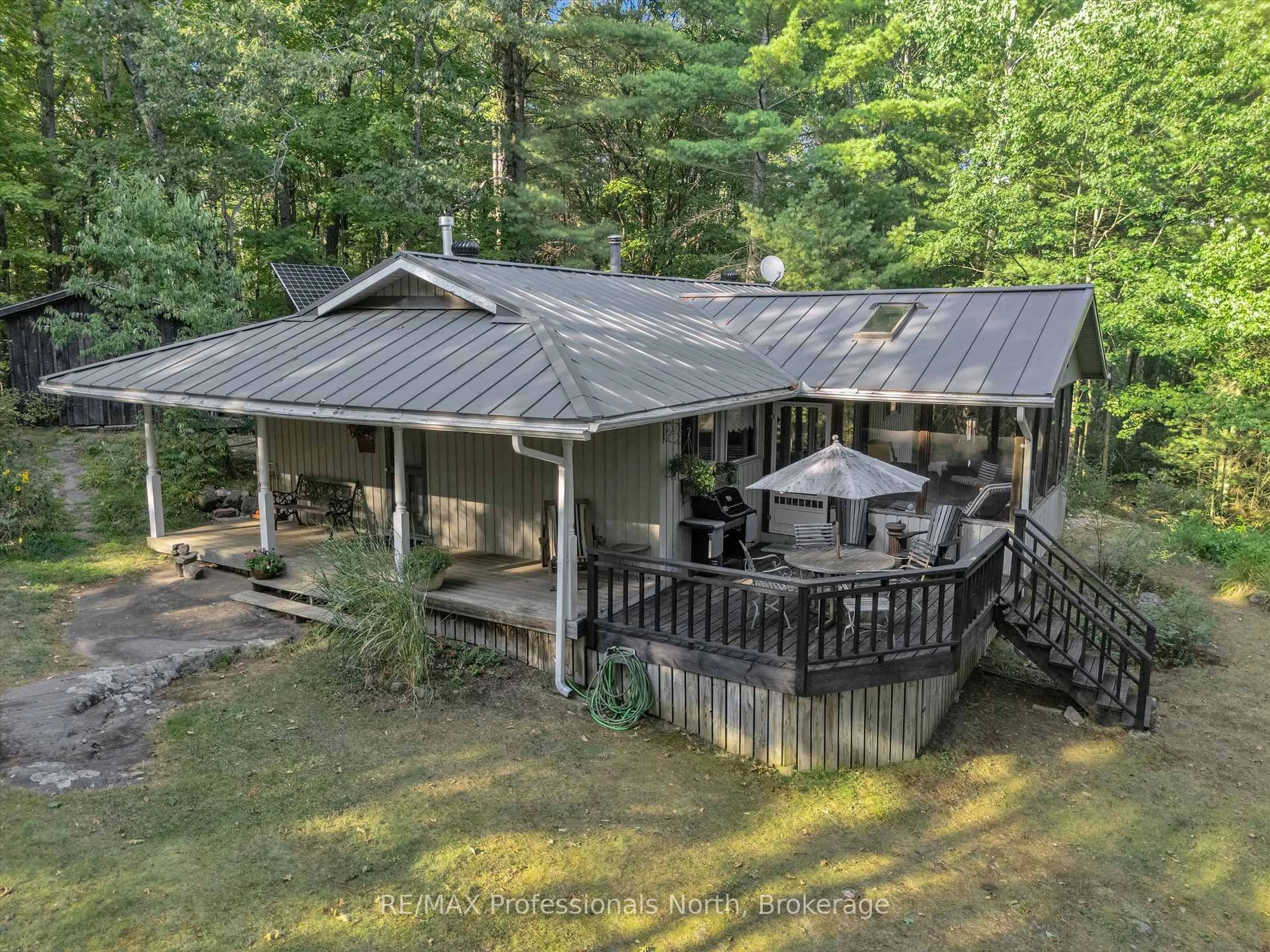 A pic from outside/outdoor area/front of a property/back of a property/a pic from drone, unknown for 1401 Rocksborough Road Pvt 2, Bracebridge Ontario P1L 1X3