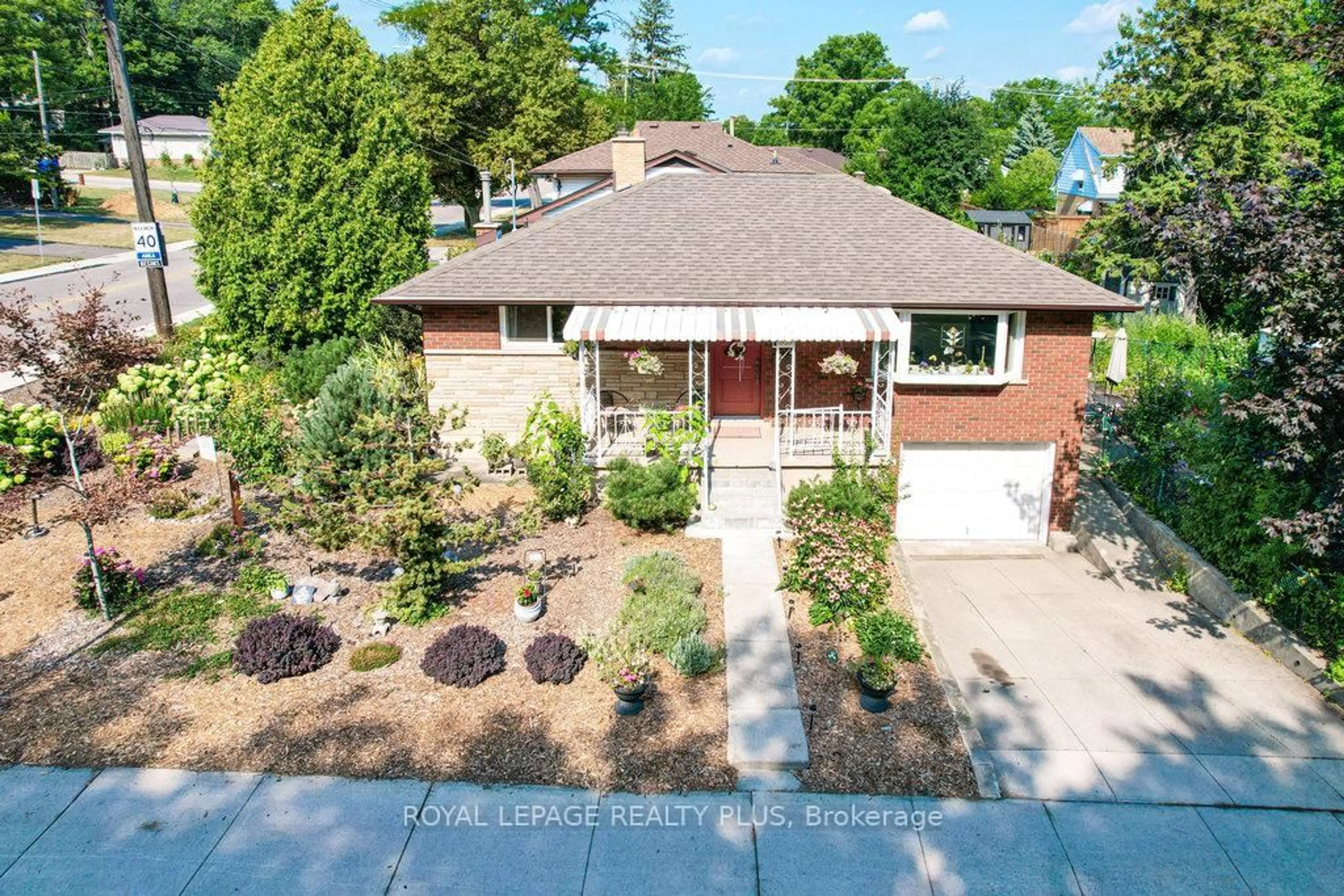 Home with brick exterior material, street for 316 Upper Paradise Rd, Hamilton Ontario L9C 5C4