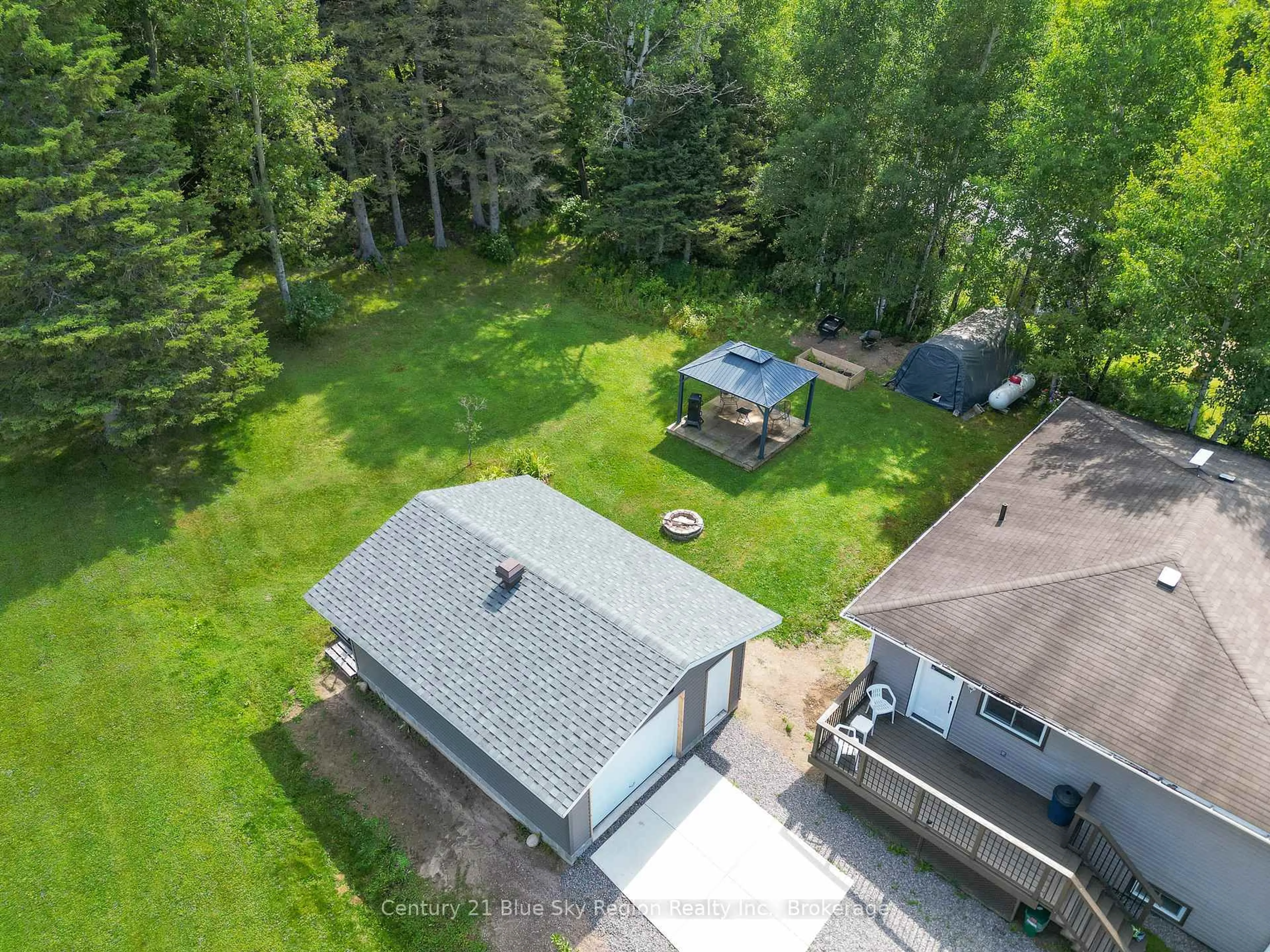 A pic from outside/outdoor area/front of a property/back of a property/a pic from drone, forest/trees view for 142 Gagnon St, Bonfield Ontario P0H 1E0