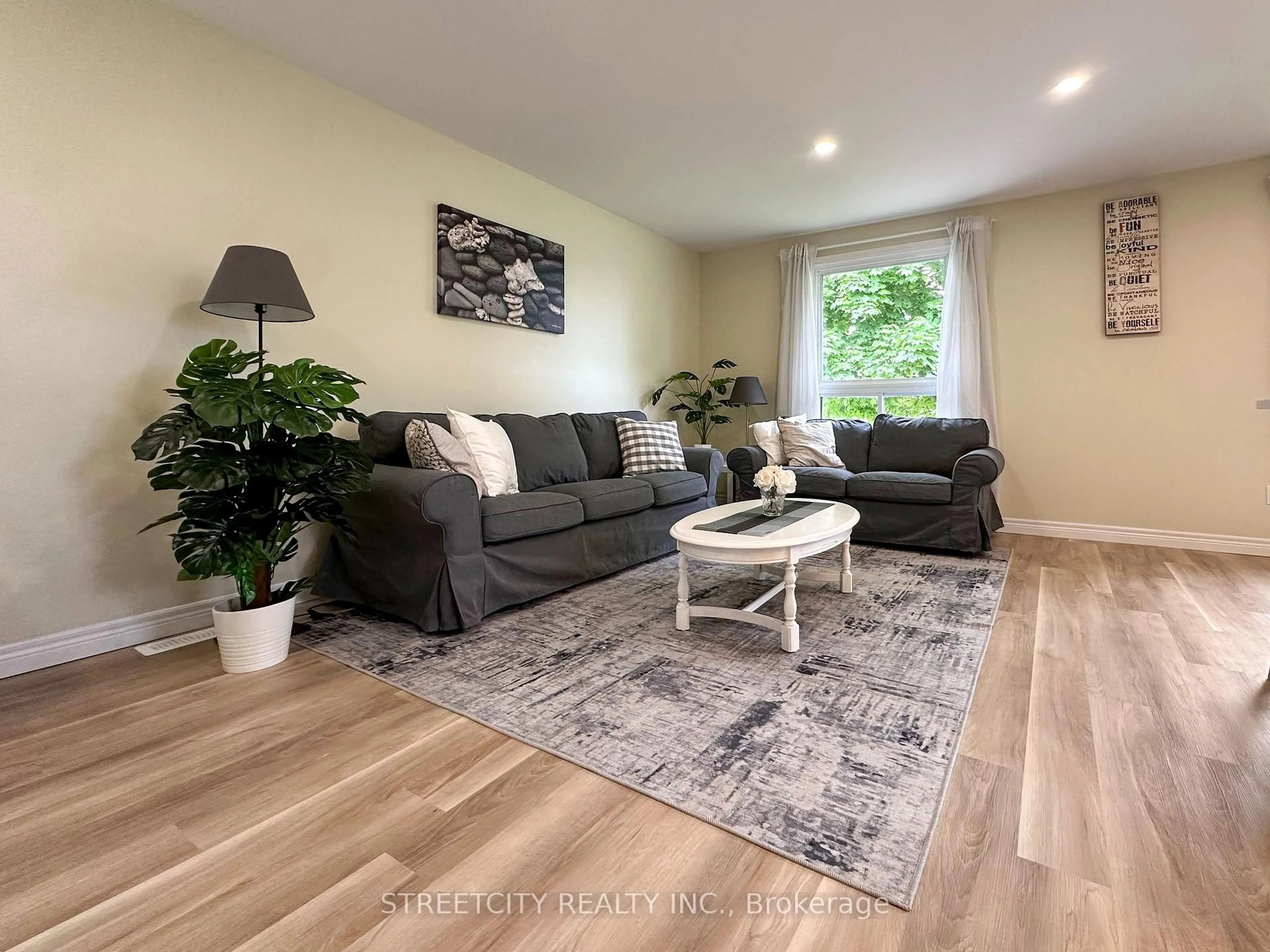 Living room with furniture, wood/laminate floor for 1578 Councillors St, St. Clair Ontario N0N 1H0