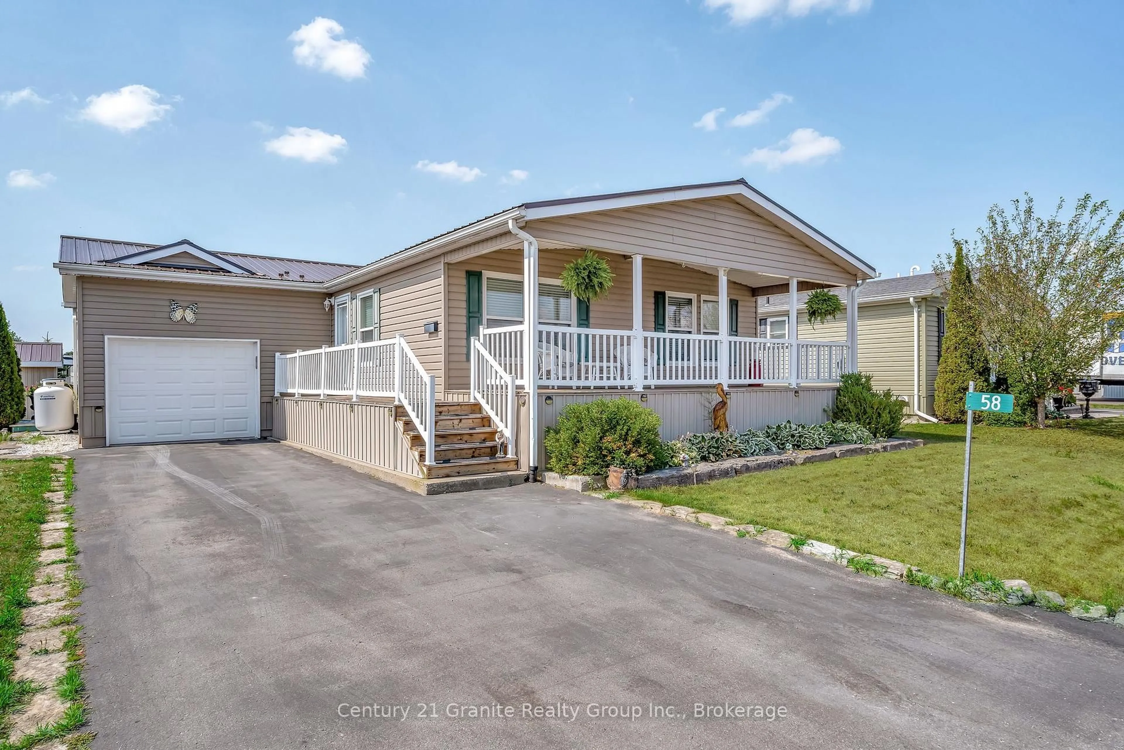 Home with vinyl exterior material, street for 58 Creekside Circ, Kawartha Lakes Ontario K0M 1L0