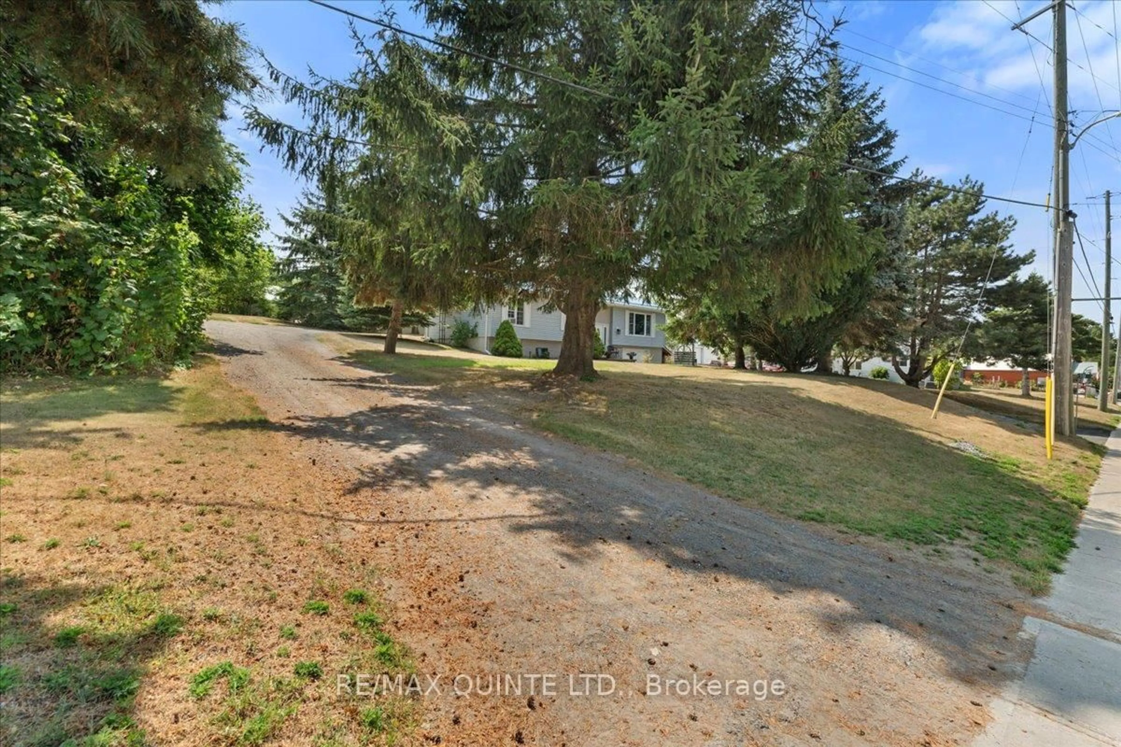 A pic from outside/outdoor area/front of a property/back of a property/a pic from drone, water/lake/river/ocean view for 19 County Rd 18 Rd, Prince Edward County Ontario K0K 1P0