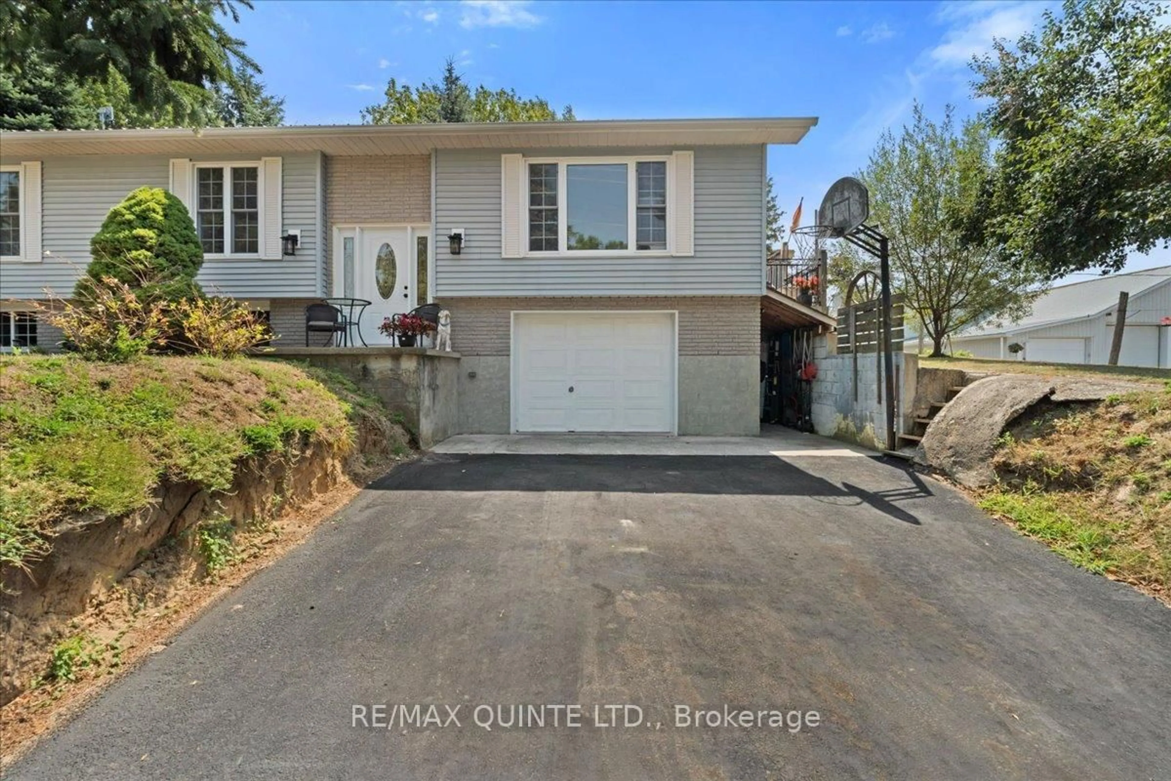 A pic from outside/outdoor area/front of a property/back of a property/a pic from drone, street for 19 County Rd 18 Rd, Prince Edward County Ontario K0K 1P0