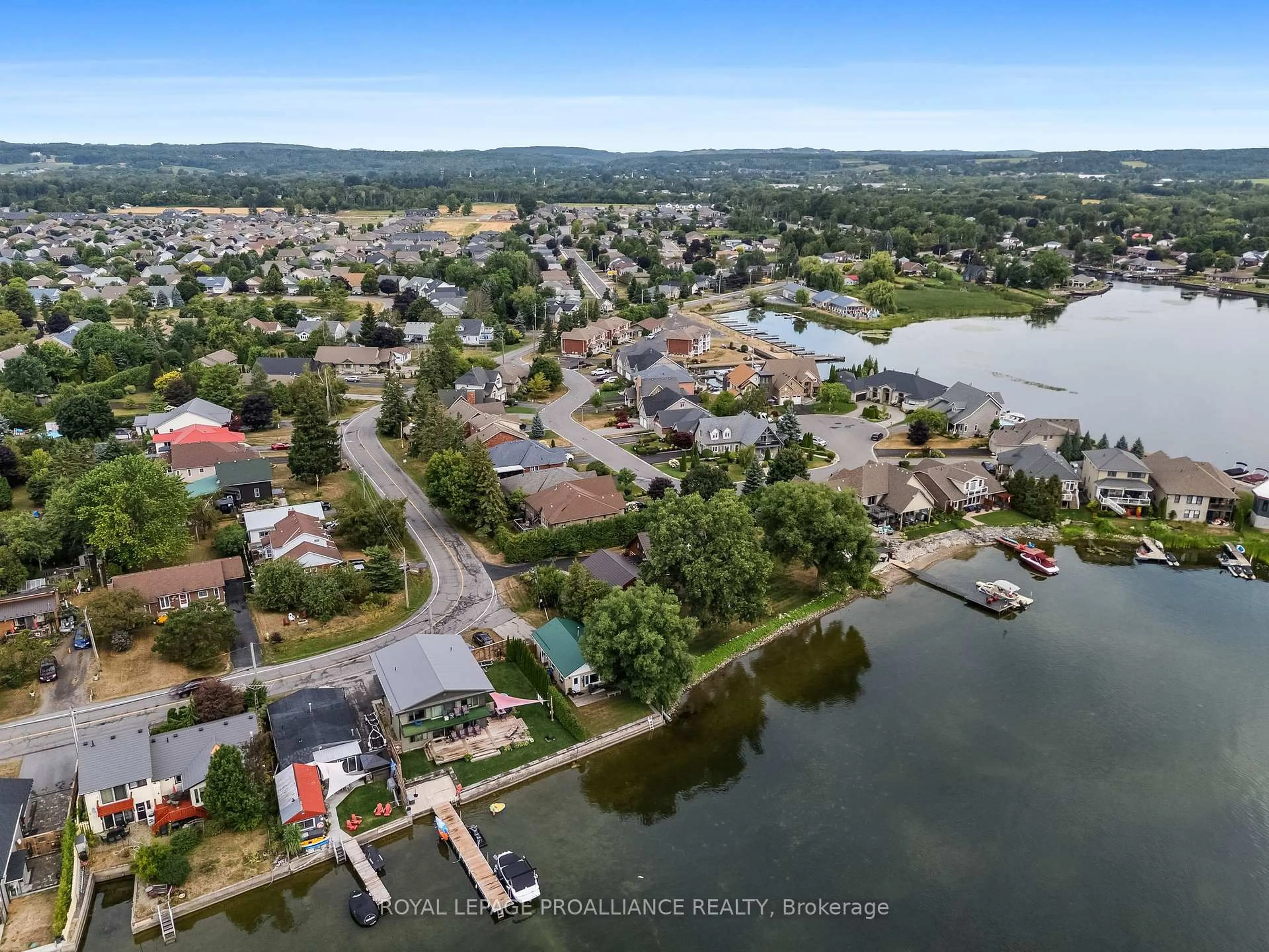 A pic from outside/outdoor area/front of a property/back of a property/a pic from drone, water/lake/river/ocean view for 14 Edgewater Dr, Brighton Ontario K0K 1H0