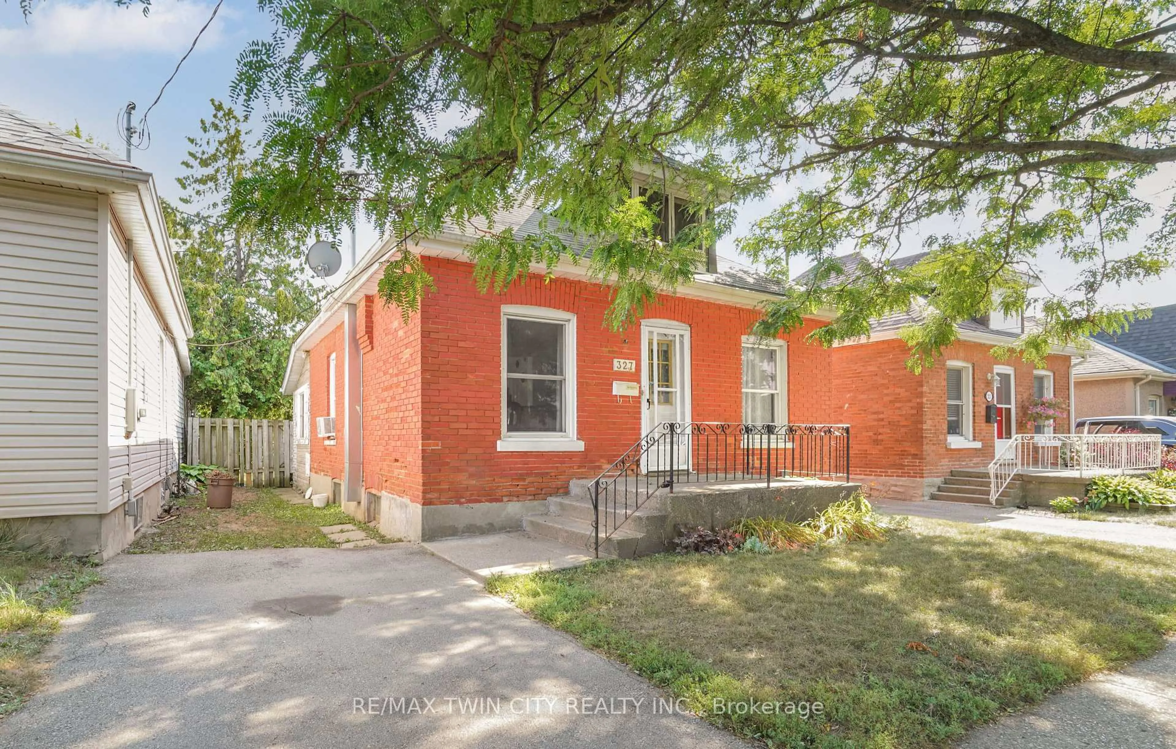 Home with brick exterior material, street for 327 Sheridan St, Brantford Ontario N3S 4R8