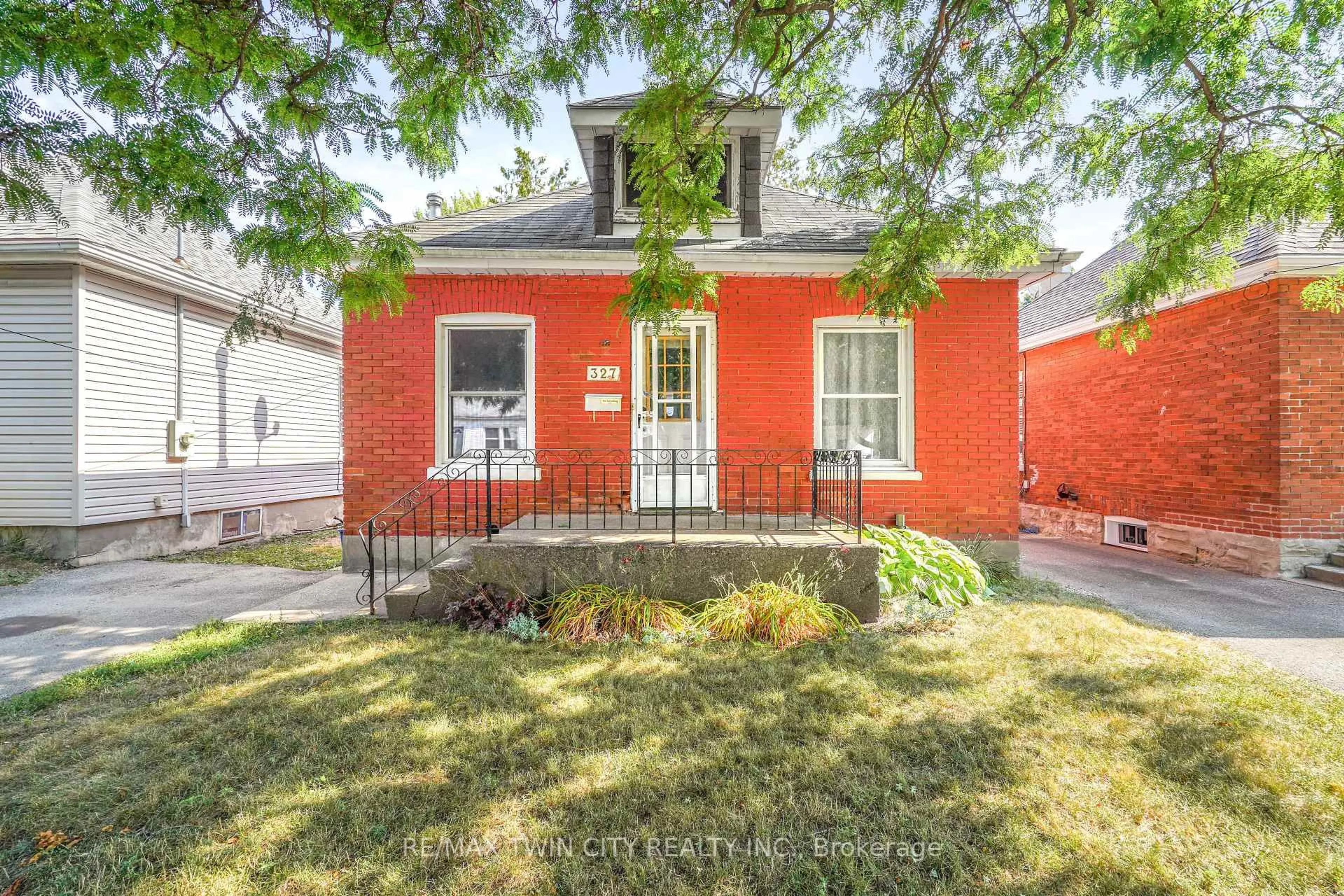 Home with brick exterior material, street for 327 Sheridan St, Brantford Ontario N3S 4R8