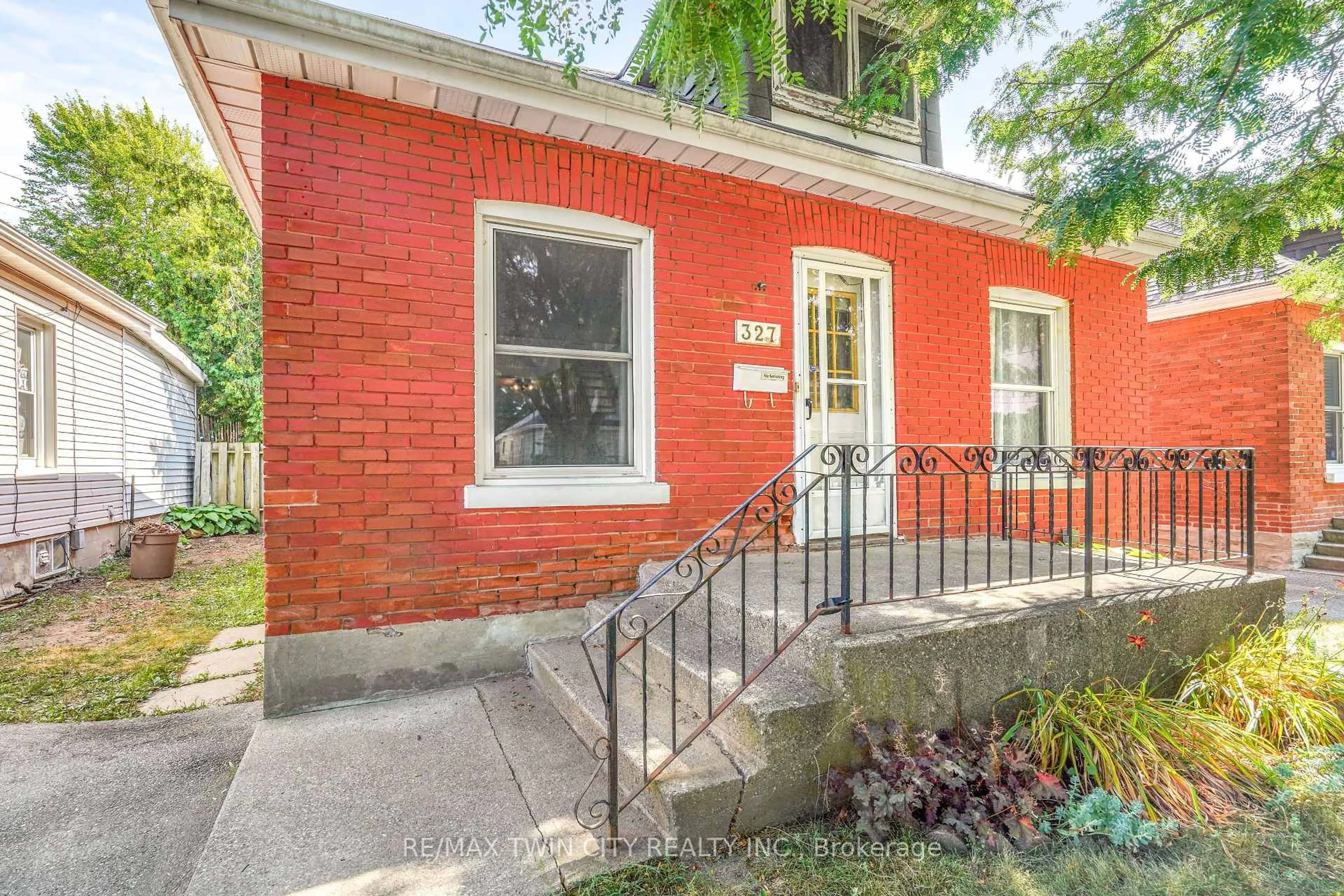 Home with brick exterior material, street for 327 Sheridan St, Brantford Ontario N3S 4R8
