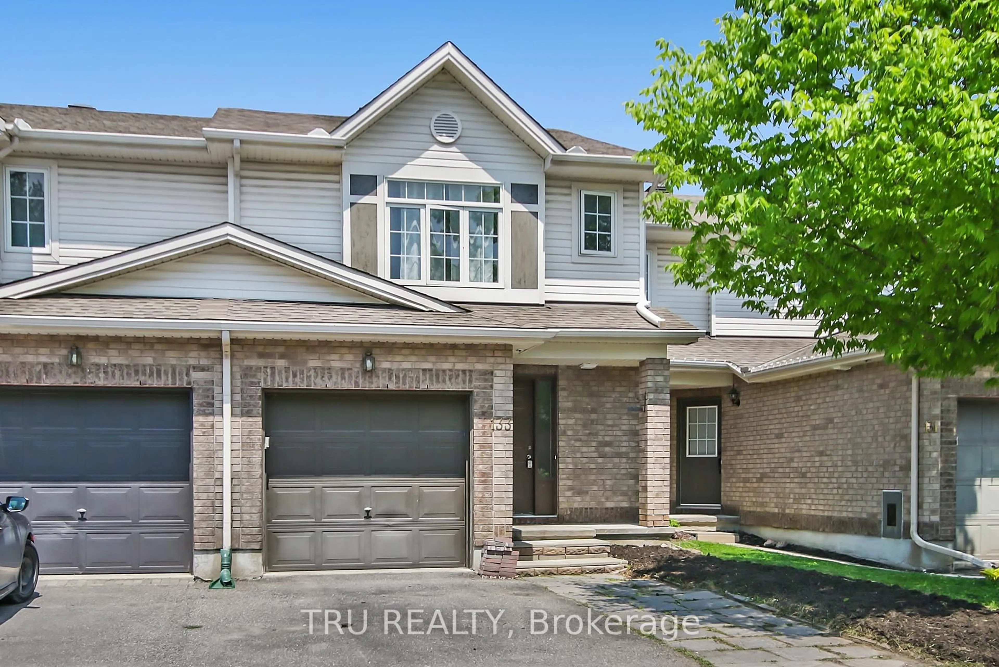 Home with brick exterior material, street for 133 Kinross Private, Ottawa Ontario K2K 3P9