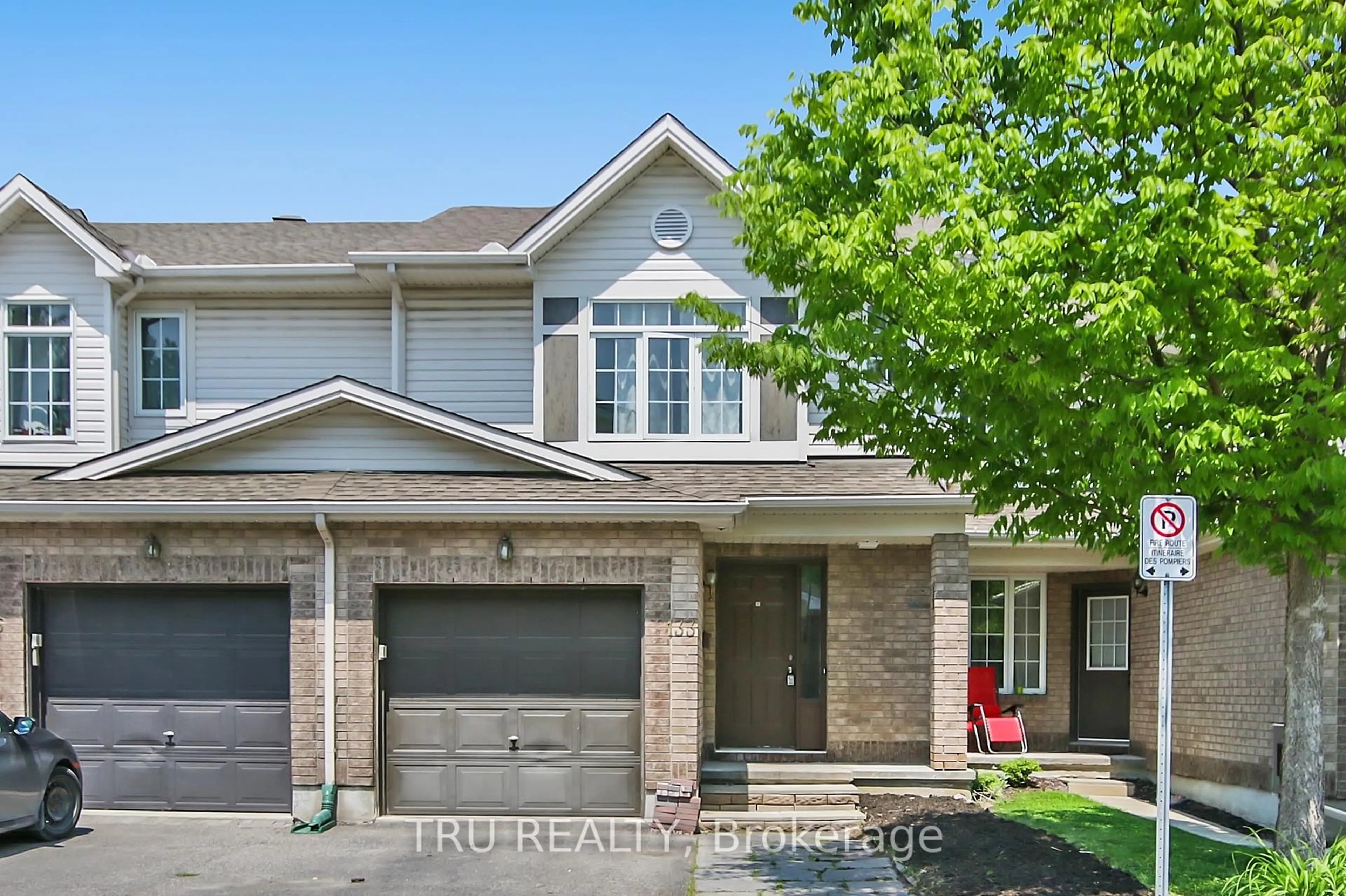Home with brick exterior material, street for 133 Kinross Private, Ottawa Ontario K2K 3P9