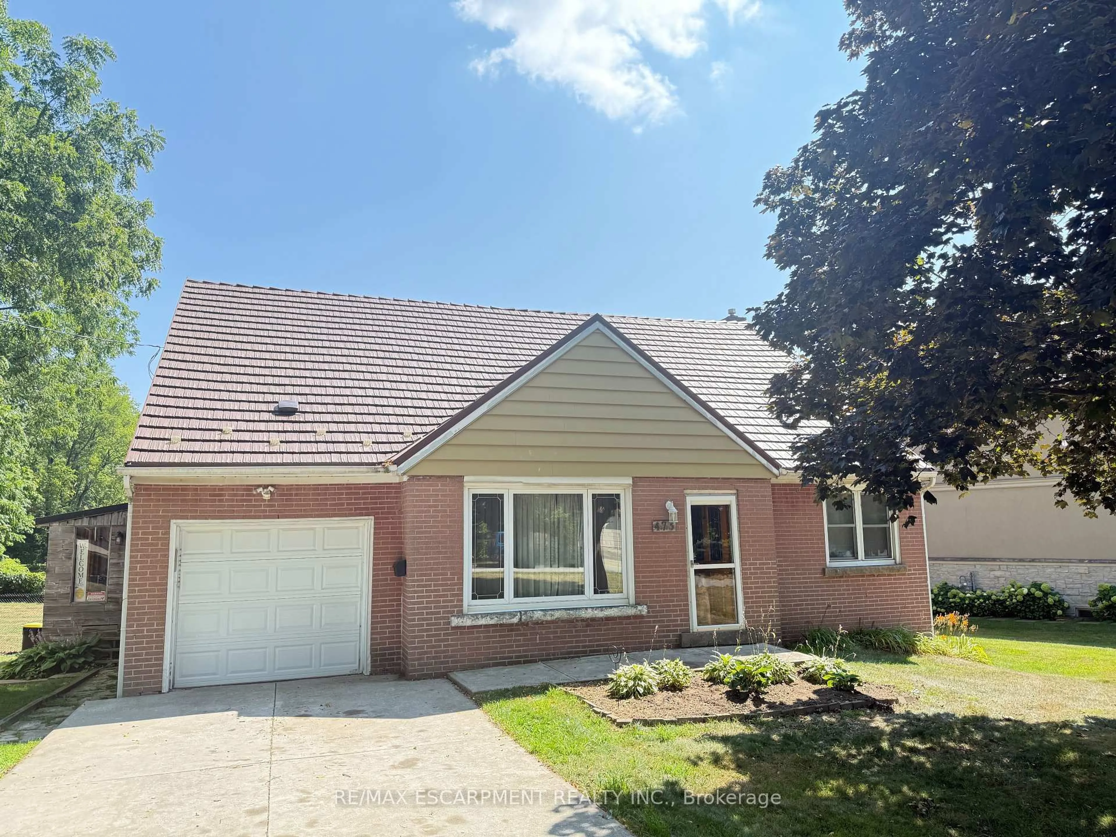 Home with brick exterior material, street for 473 Hamilton Dr, Hamilton Ontario L9G 2A9