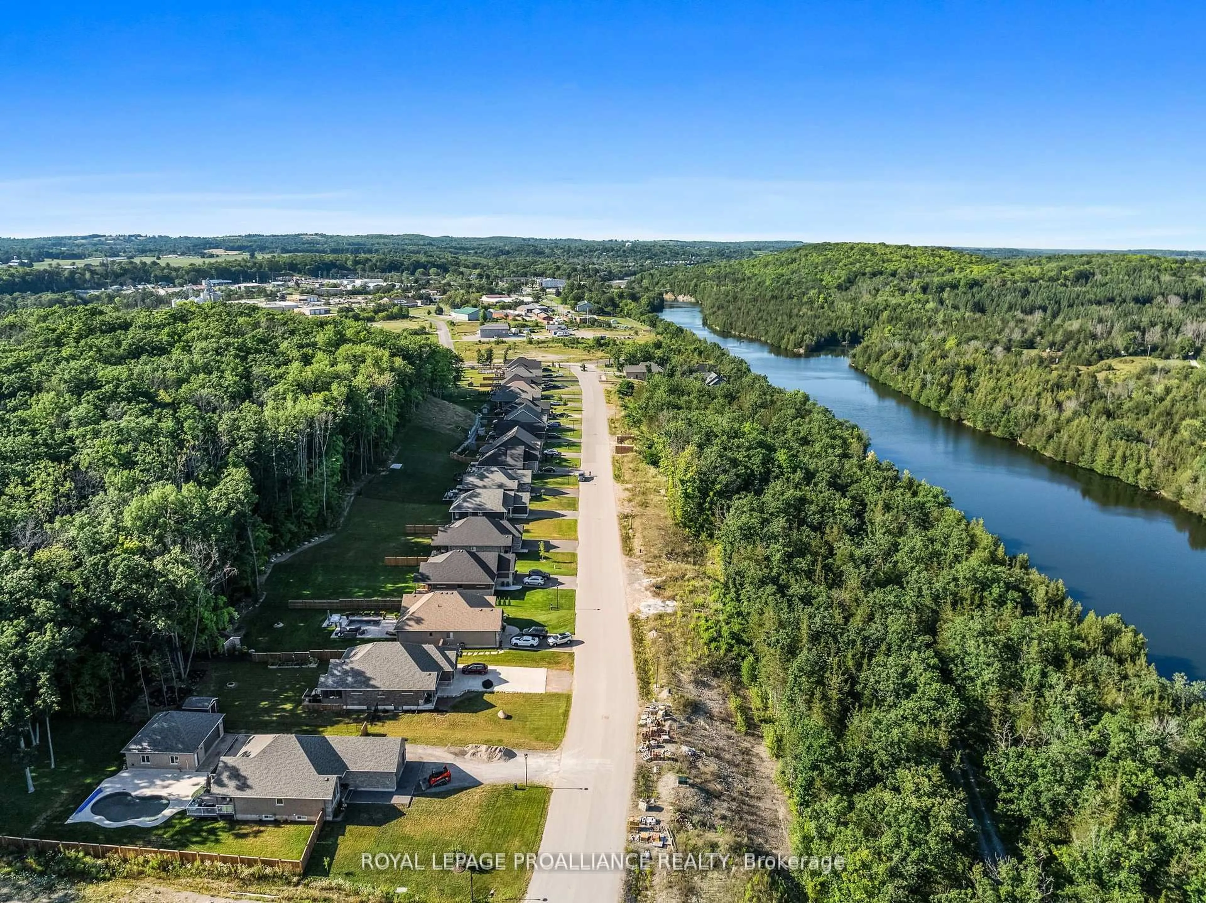 A pic from outside/outdoor area/front of a property/back of a property/a pic from drone, water/lake/river/ocean view for 38 Riverside Tr, Trent Hills Ontario K0L 1L0