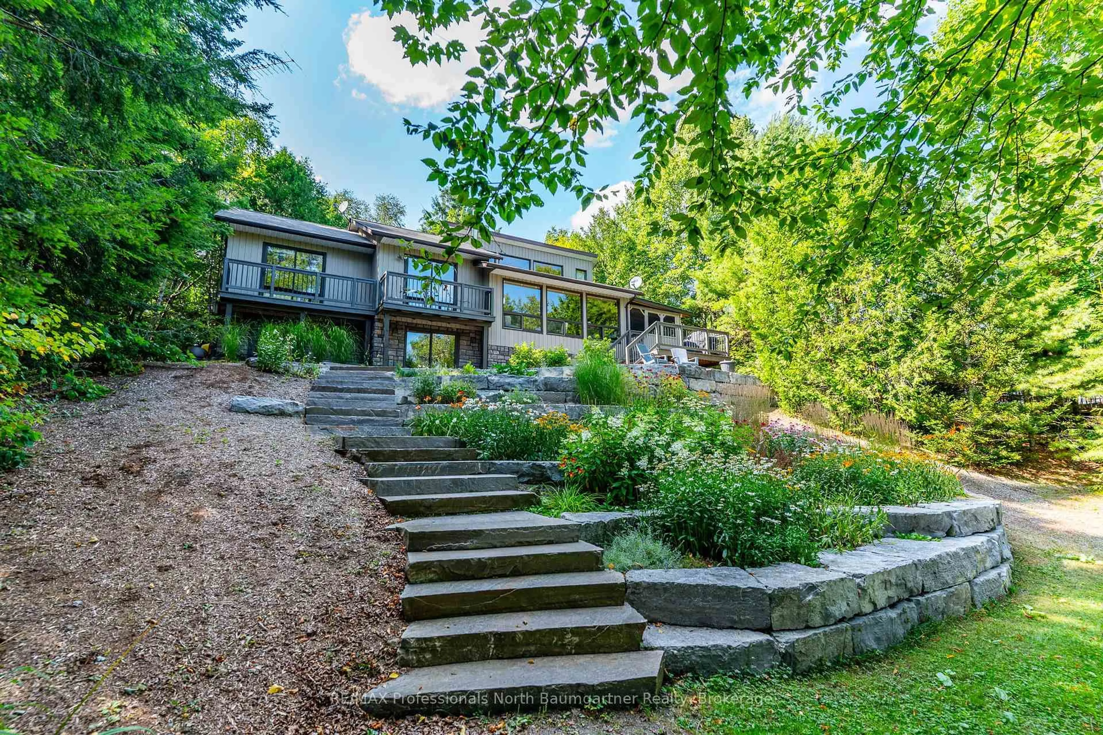 A pic from outside/outdoor area/front of a property/back of a property/a pic from drone, unknown for 1976 Redkenn Rd, Dysart et al Ontario K0M 1S0