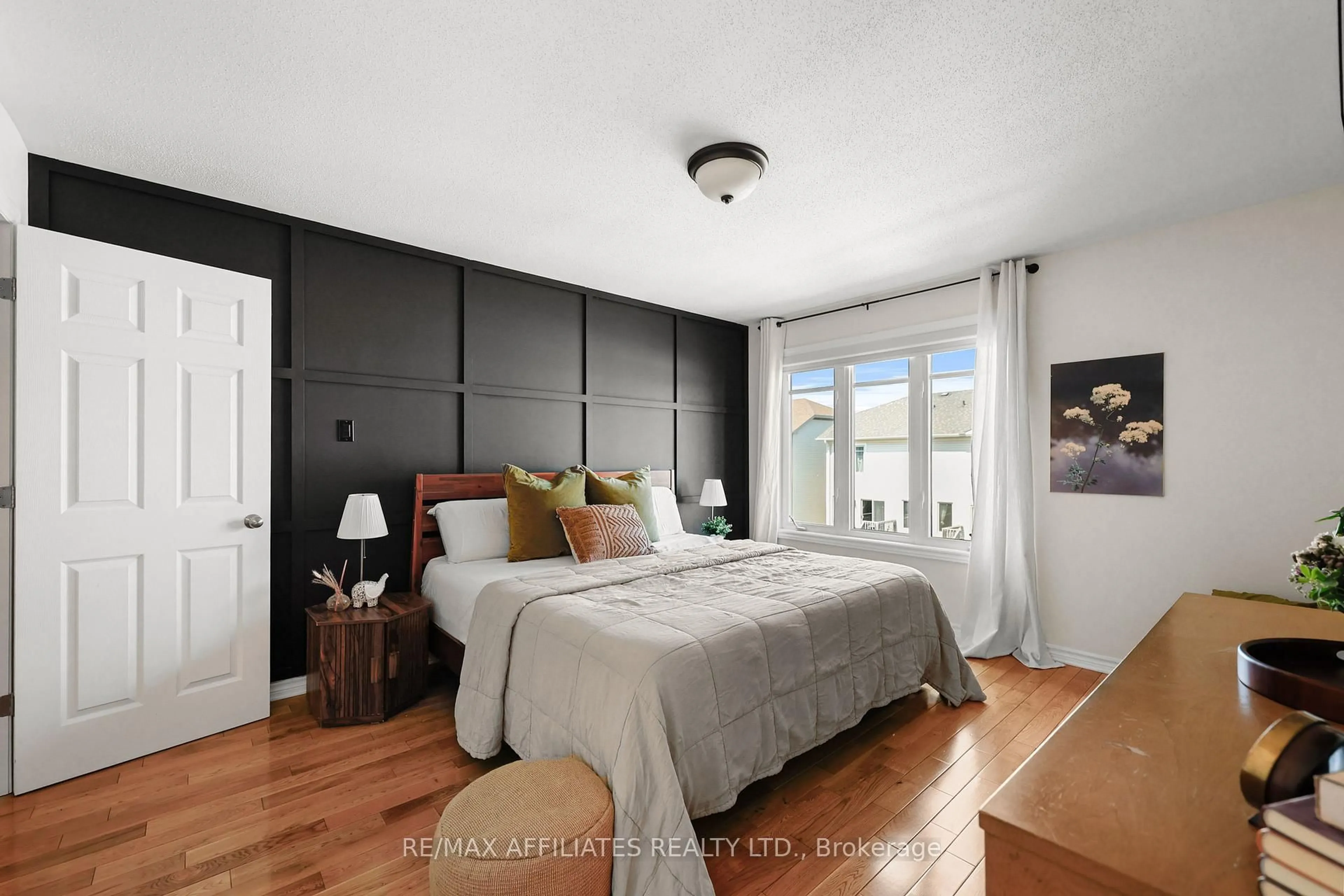 Bedroom with bed, wood/laminate floor for 386 Ann St, Almonte Ontario K0A 1A0
