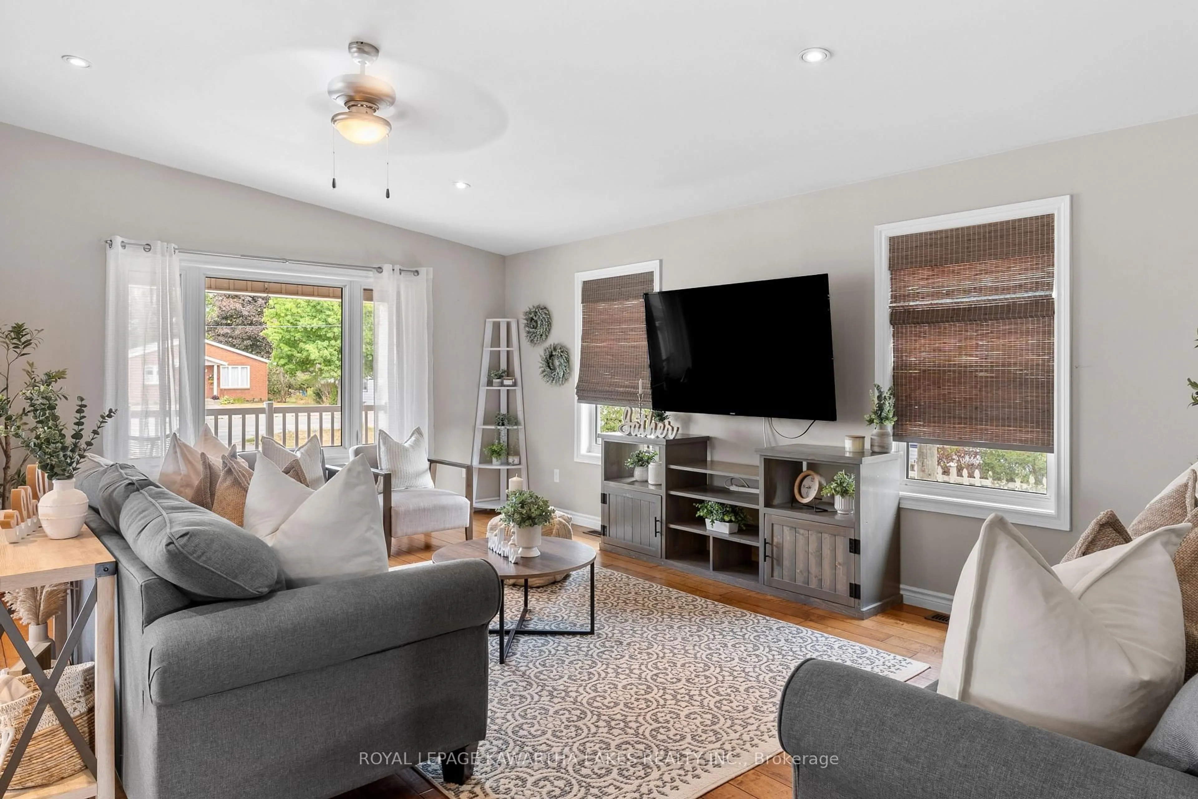Living room with furniture, wood/laminate floor for 95 Lindsay St, Kawartha Lakes Ontario K0M 1N0