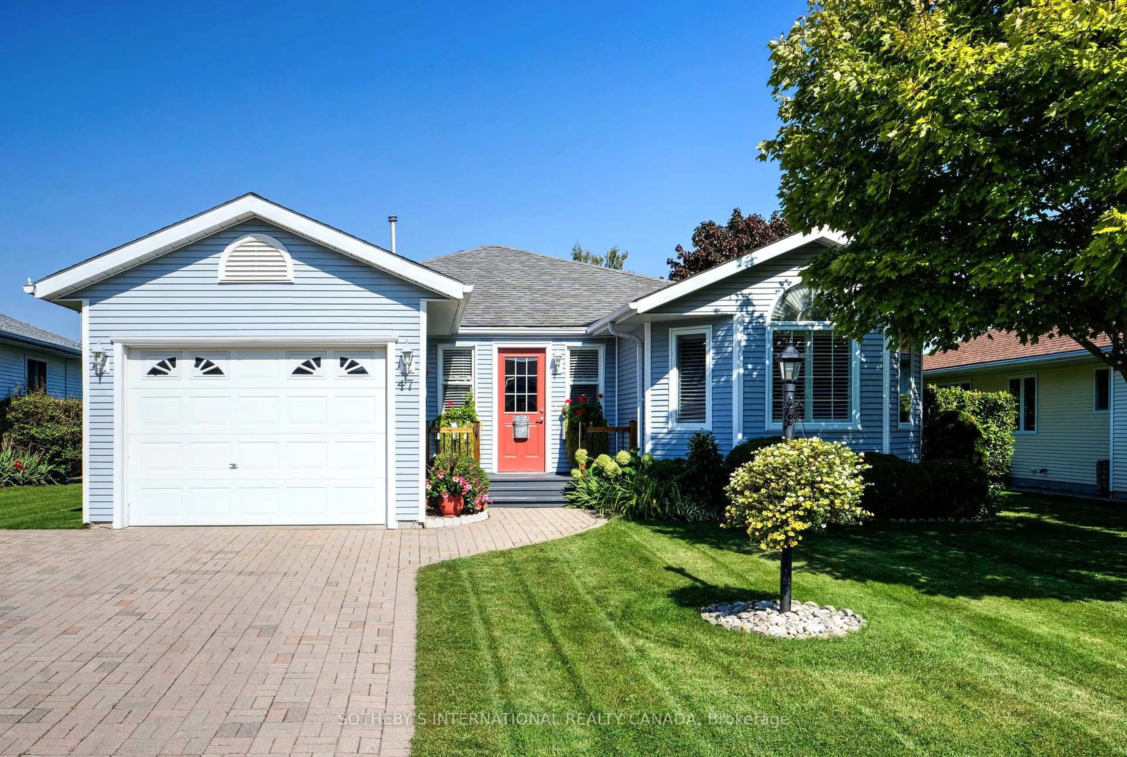 Home with vinyl exterior material, street for 47 Cretney Dr, Prince Edward County Ontario K0K 3L0