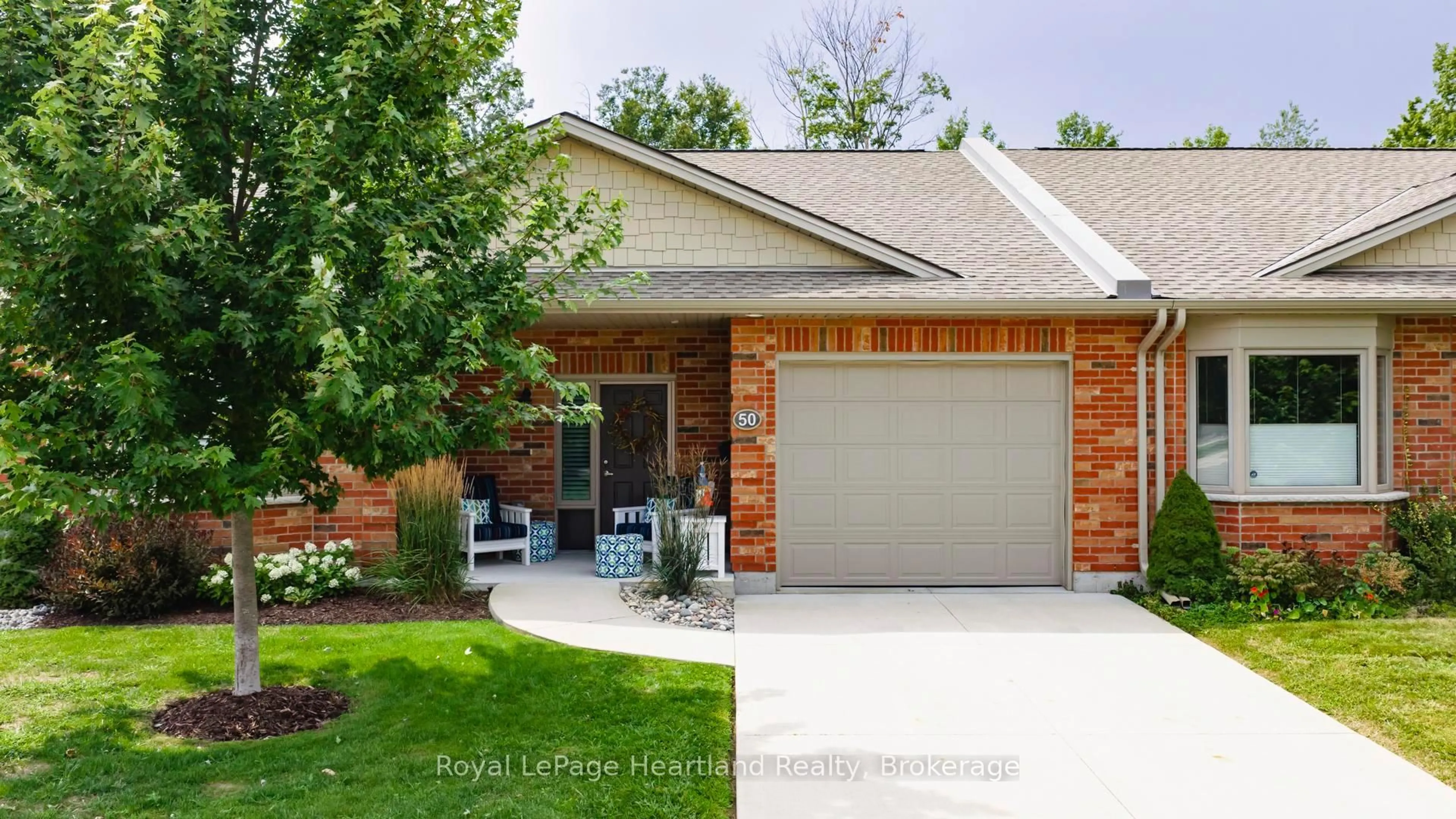Home with brick exterior material, street for 50 Bayfield Mews Lane, Bluewater Ontario N0M 1G0