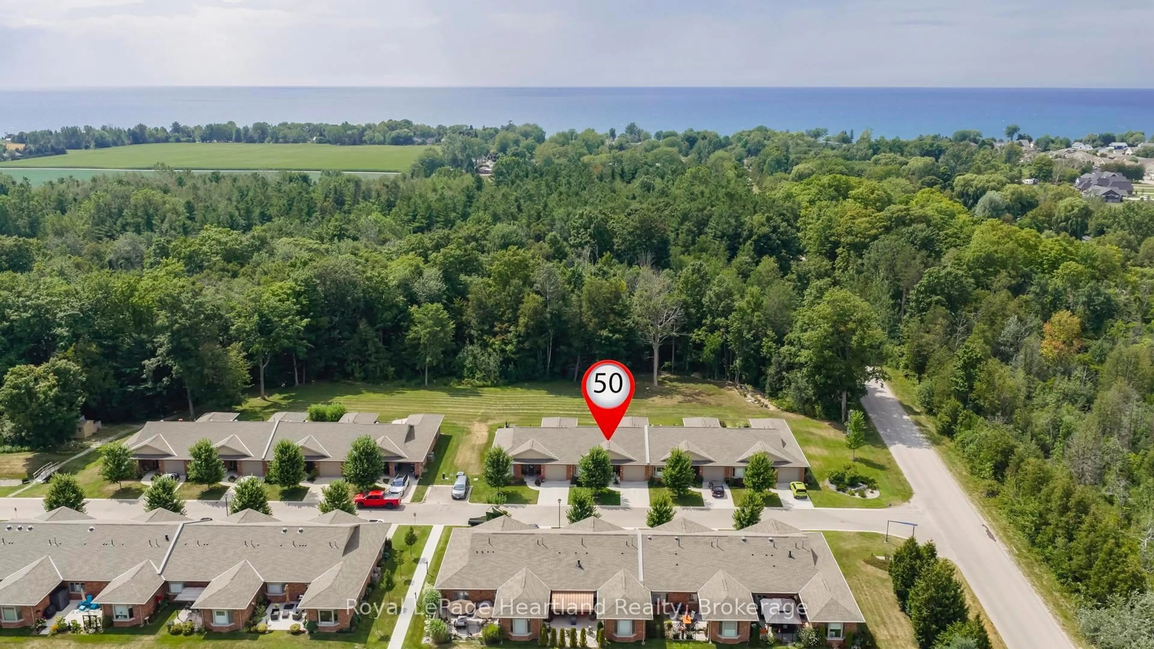 A pic from outside/outdoor area/front of a property/back of a property/a pic from drone, water/lake/river/ocean view for 50 Bayfield Mews Lane, Bluewater Ontario N0M 1G0