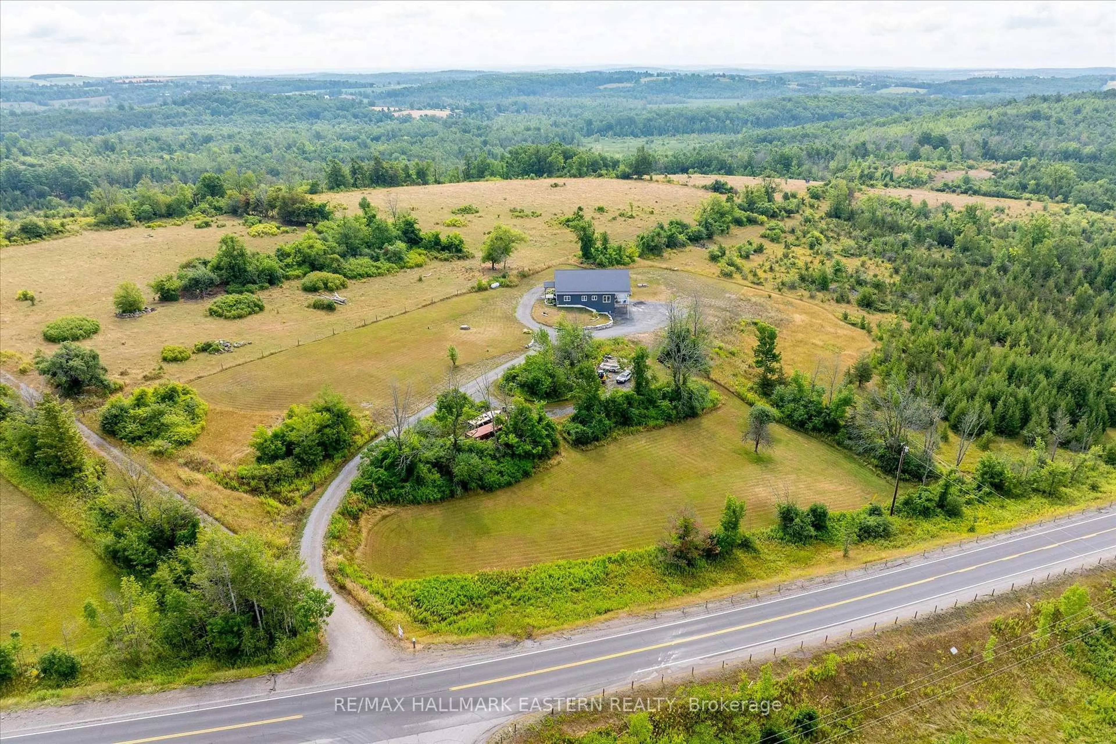 A pic from outside/outdoor area/front of a property/back of a property/a pic from drone, mountain view for 10943 County Rd 45, Trent Hills Ontario K0L 1Y0