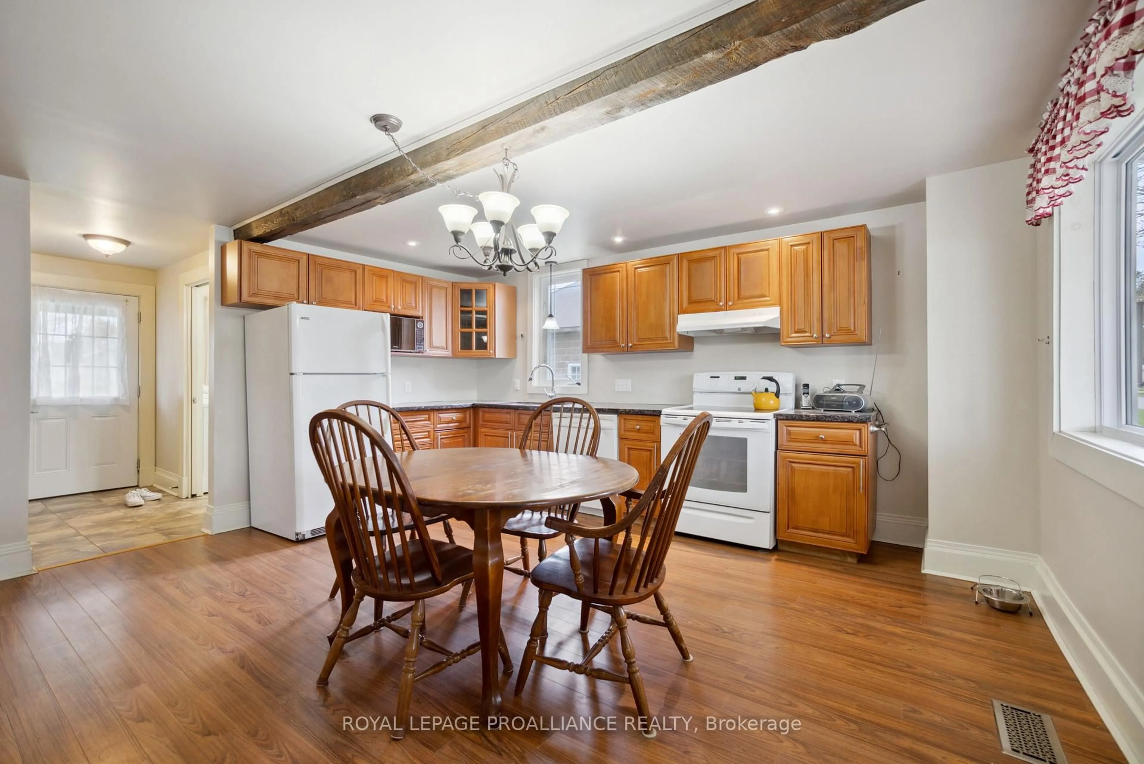 Open concept kitchen, wood/laminate floor for 6 Clement St, Kaladar Ontario K0H 1P0