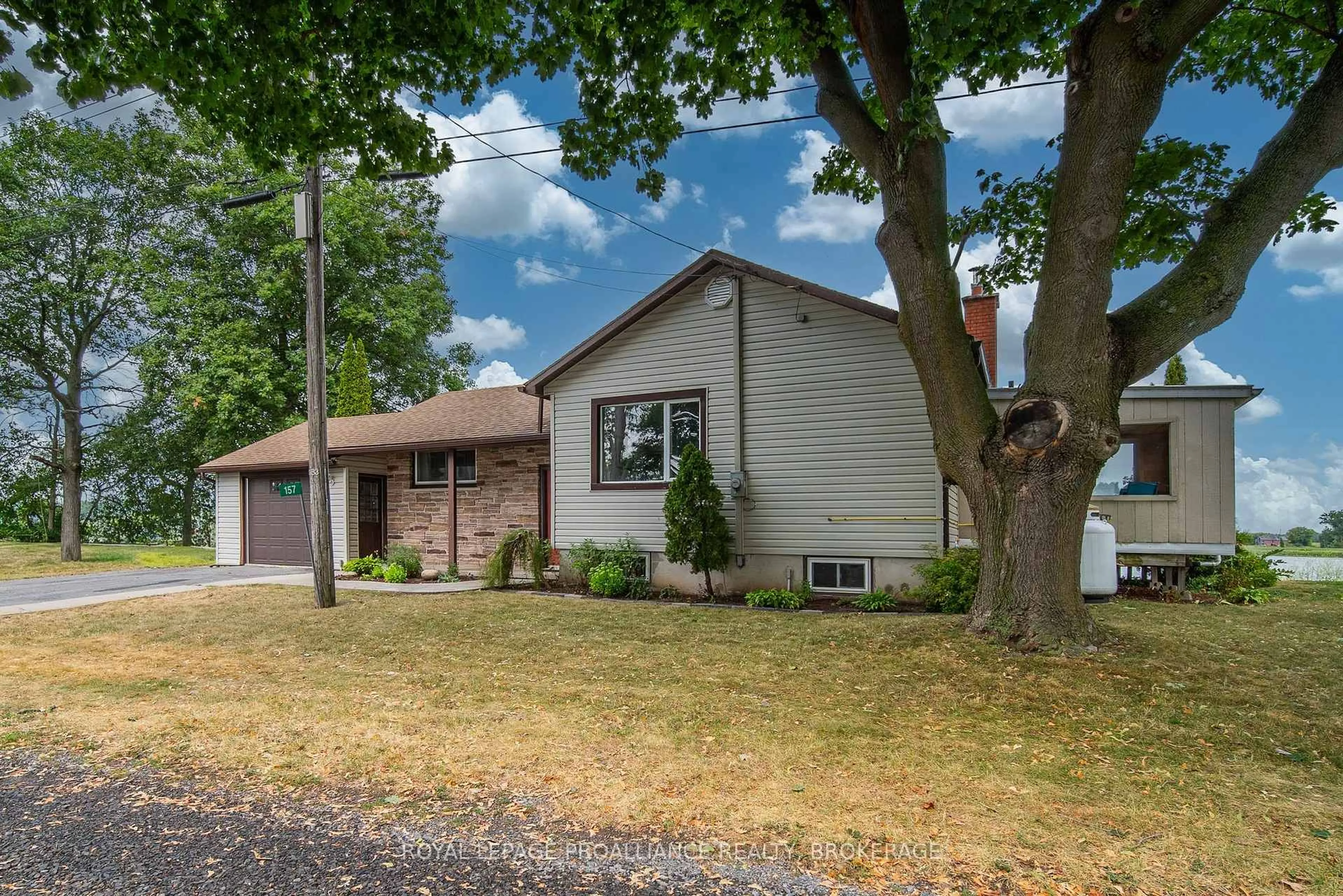 Home with vinyl exterior material, street for 157 Unger Island Rd, Greater Napanee Ontario K7R 3L1